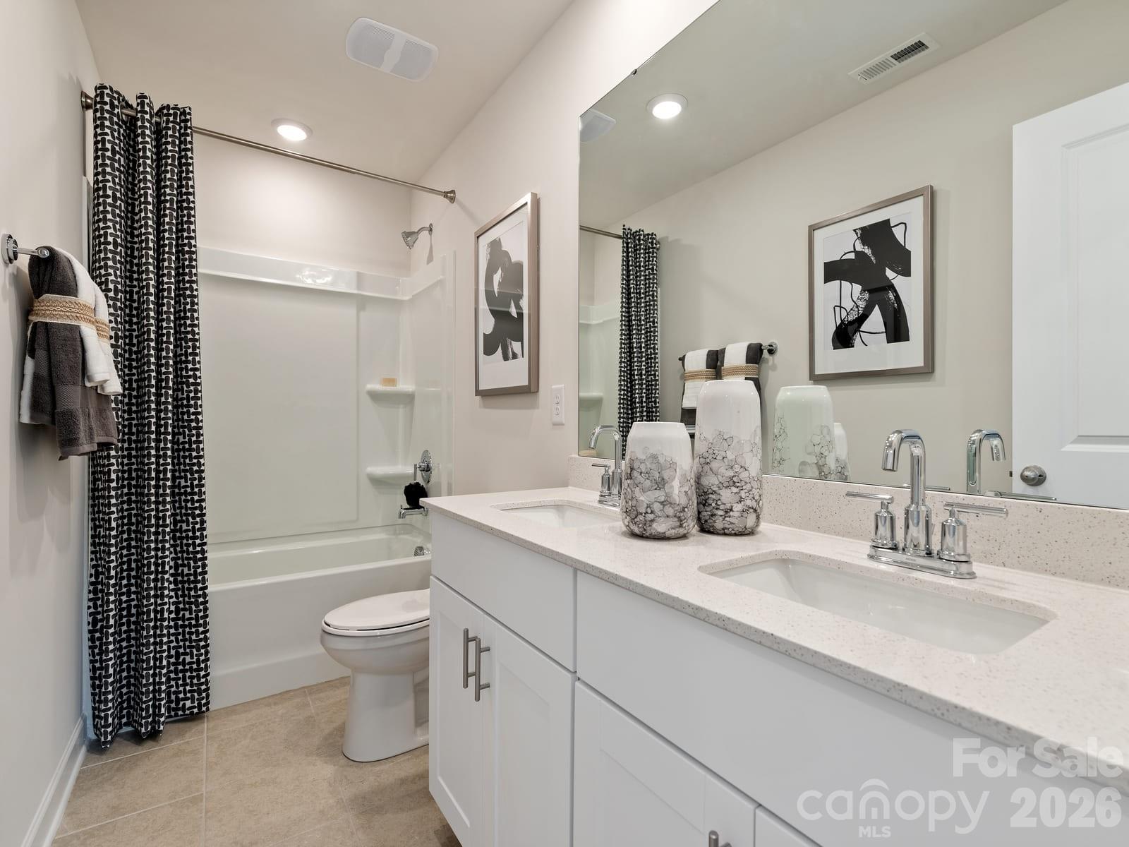 Photo is not of the actual home, but is an inspirational photo of builder’s model home and may depict options, furnishings, and/or decorator features that are not included - 12636 Russellwood Lane, Charlotte