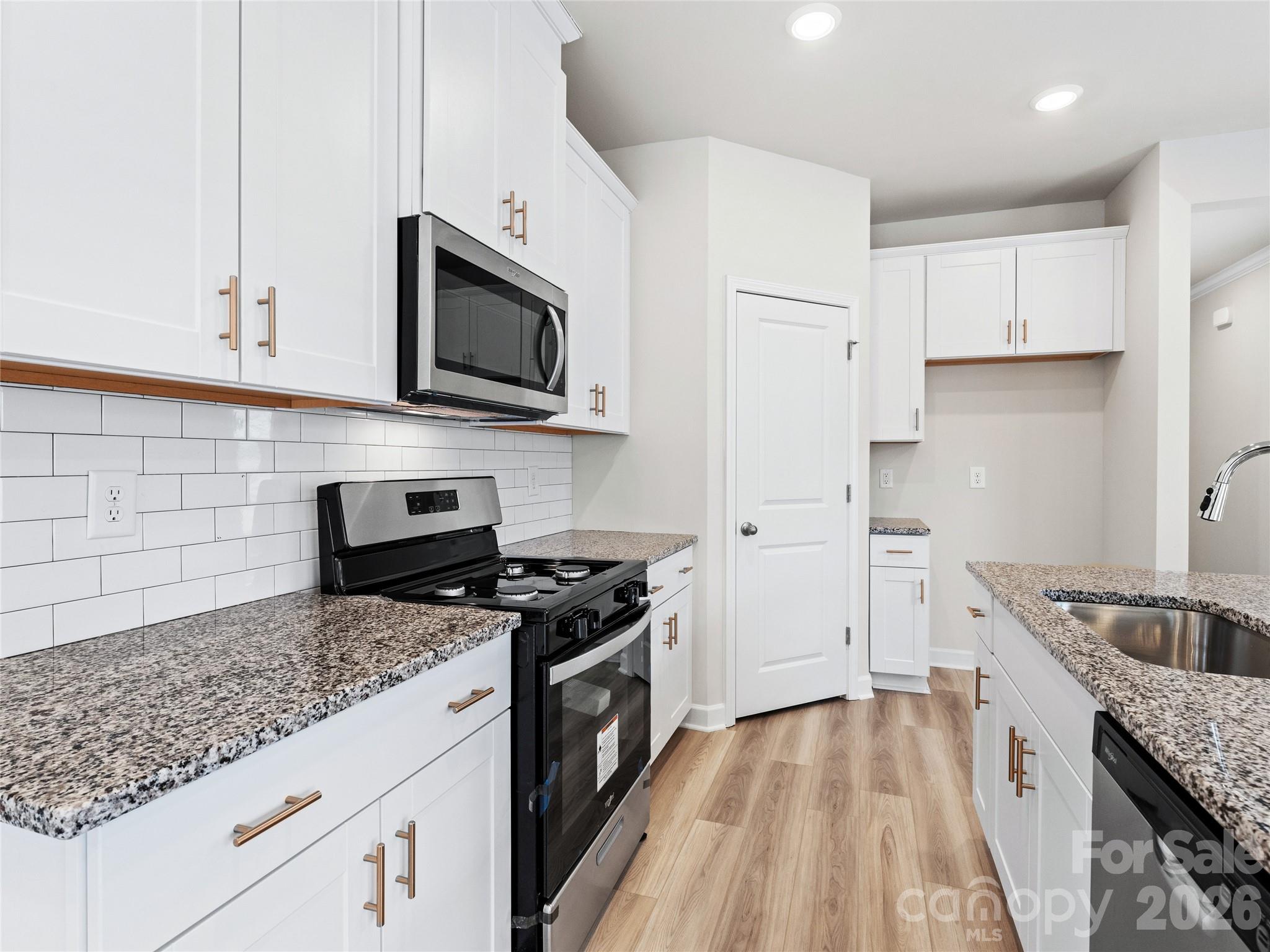 Photo is not of the actual home, but is an inspirational photo of builder’s model home and may depict options, furnishings, and/or decorator features that are not included - 12531 Russellwood Lane, Charlotte