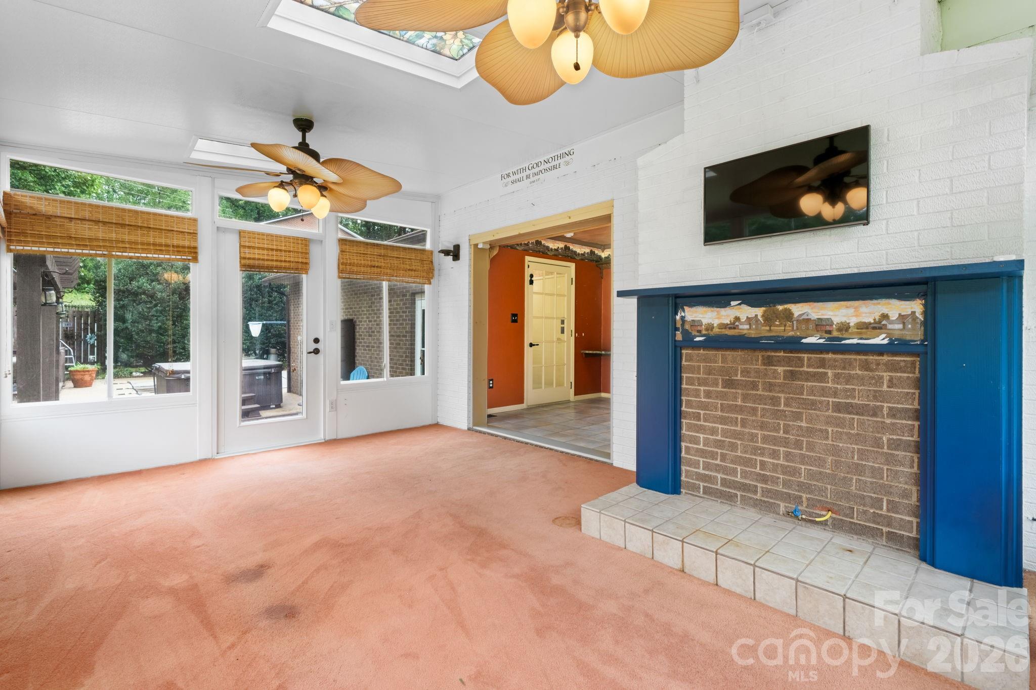 sunroom leading to outdoor deck - 3110 Ninth Tee Drive, Newton