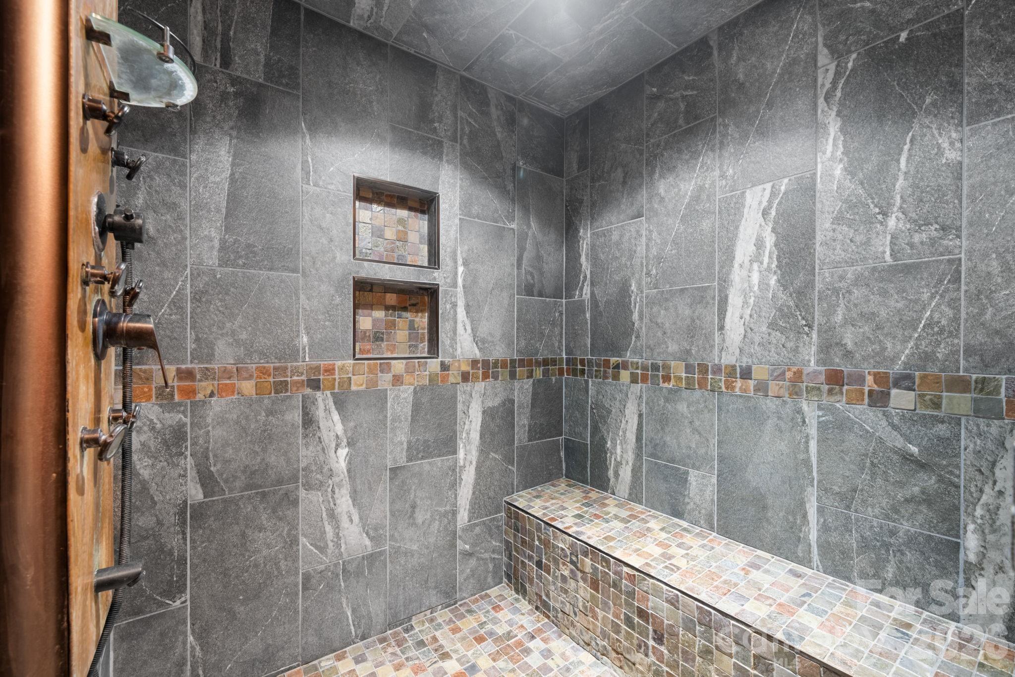 basement primary suite walk in shower - 3110 Ninth Tee Drive, Newton