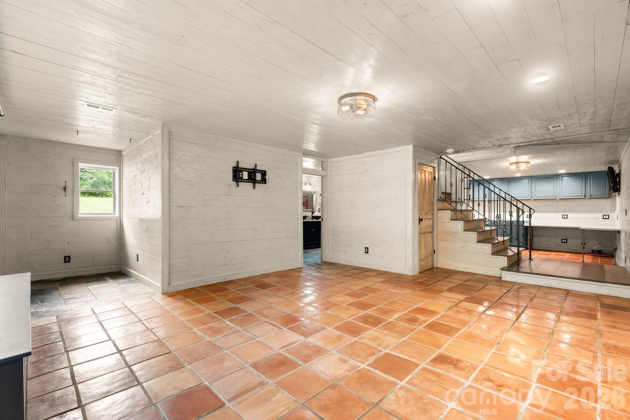 basement area view toward stairs - 3110 Ninth Tee Drive, Newton