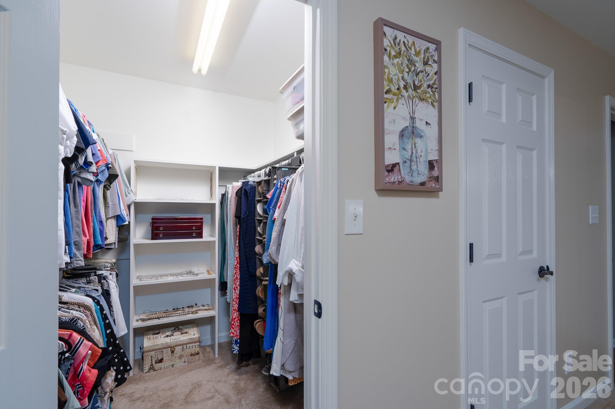 Walk-in closet primary bedroom is one of two closets. - 309 Imperial Way, Albemarle