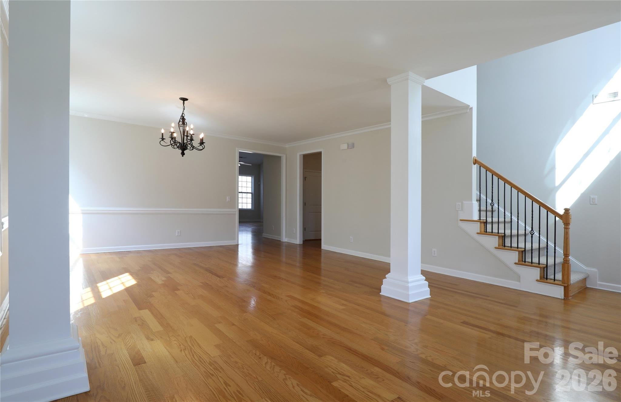 Living room and dining room are open and offer flexibility to serve a variety of needs. - 18465 E Marbella Lane, Fort Mill
