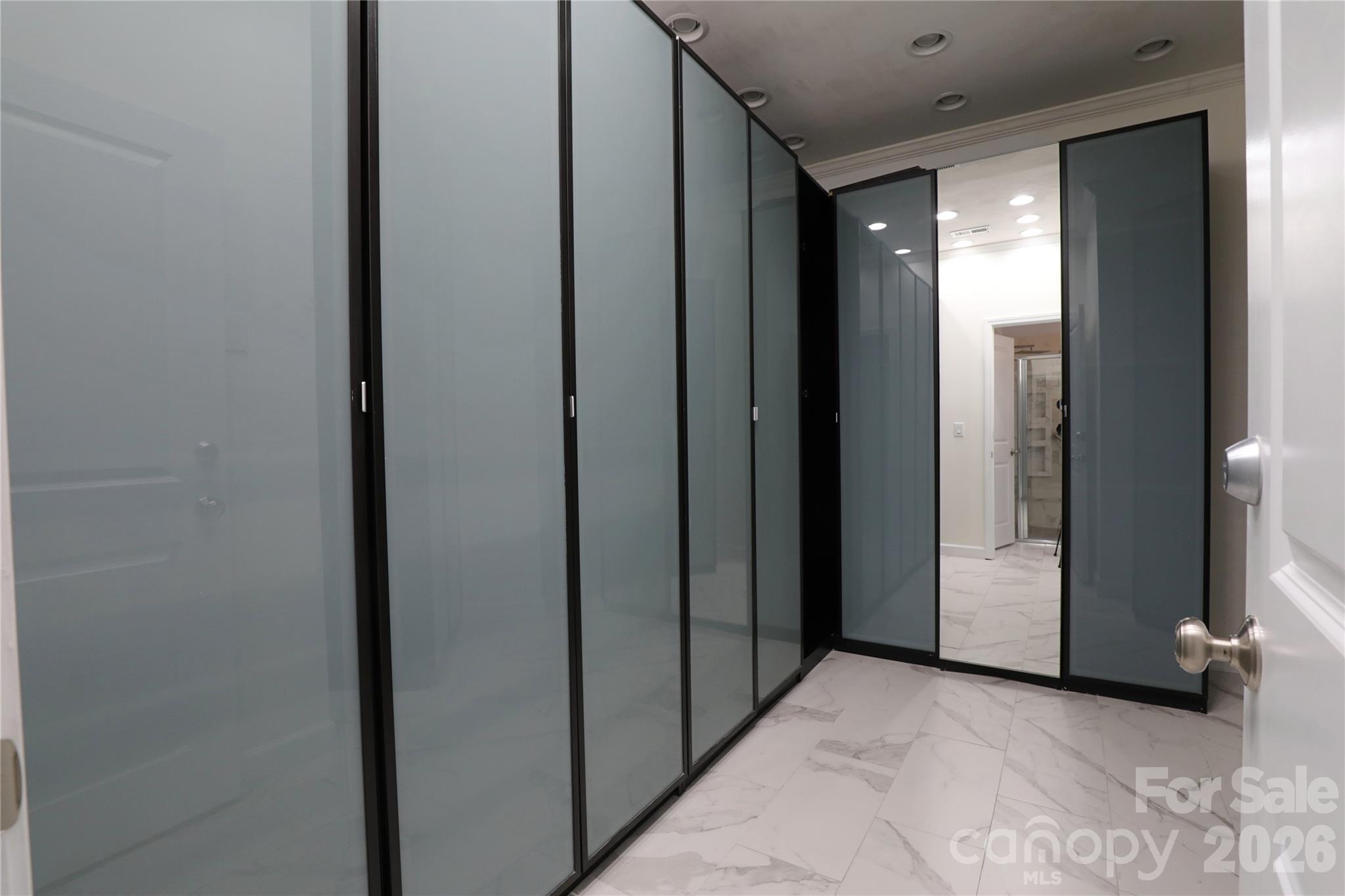 Walk in closet has doors that can be easily removed if open shelving is desired - 18465 E Marbella Lane, Fort Mill