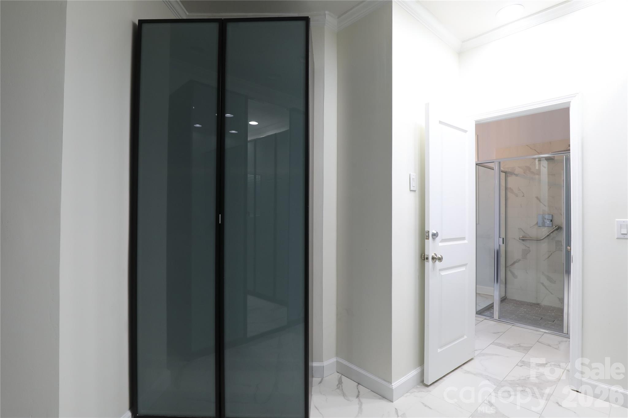Walk in closet has doors that can be easily removed if open shelving is desired - 18465 E Marbella Lane, Fort Mill