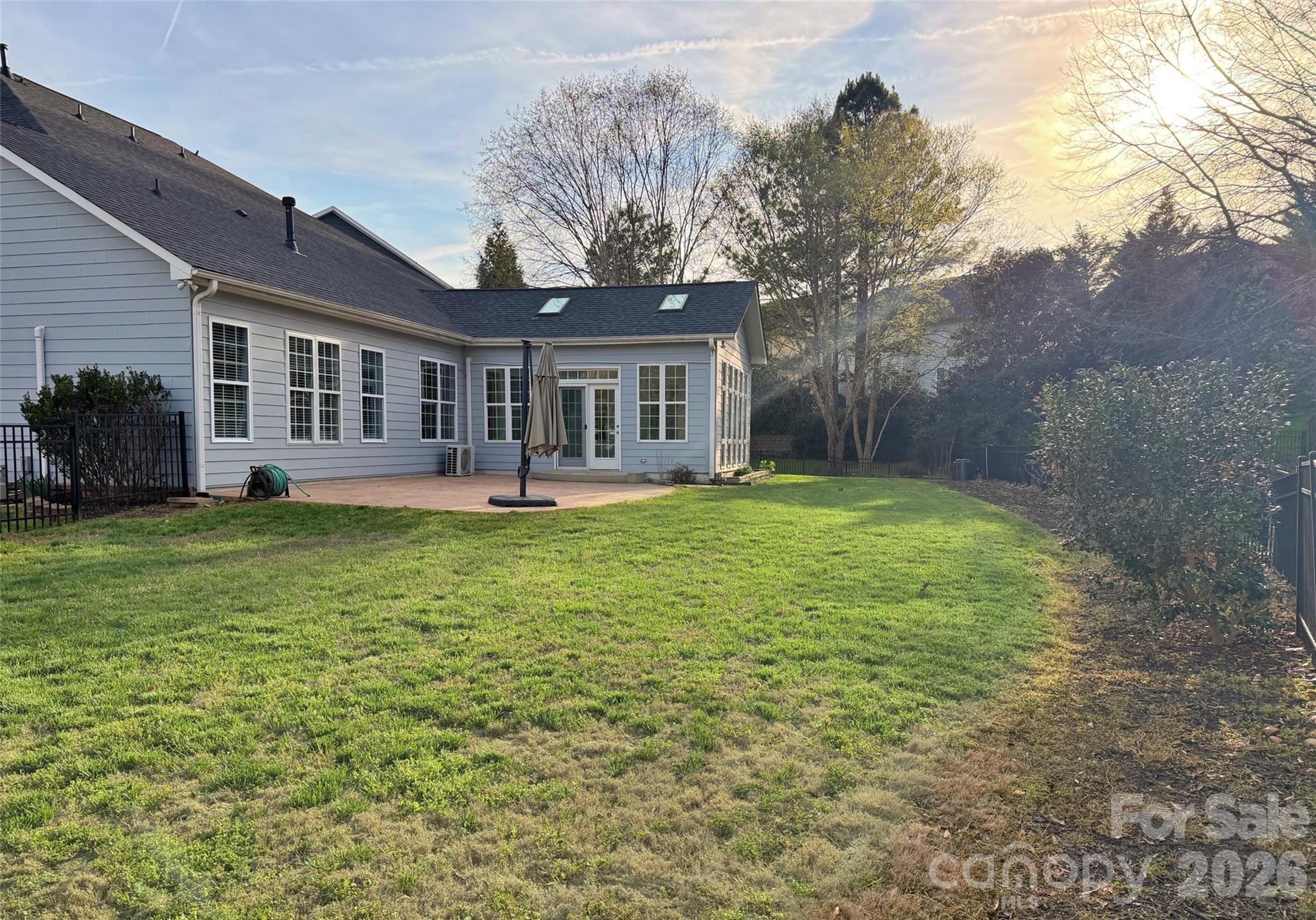 Level rear yard is spacious with room to garden and personalize - 18465 E Marbella Lane, Fort Mill