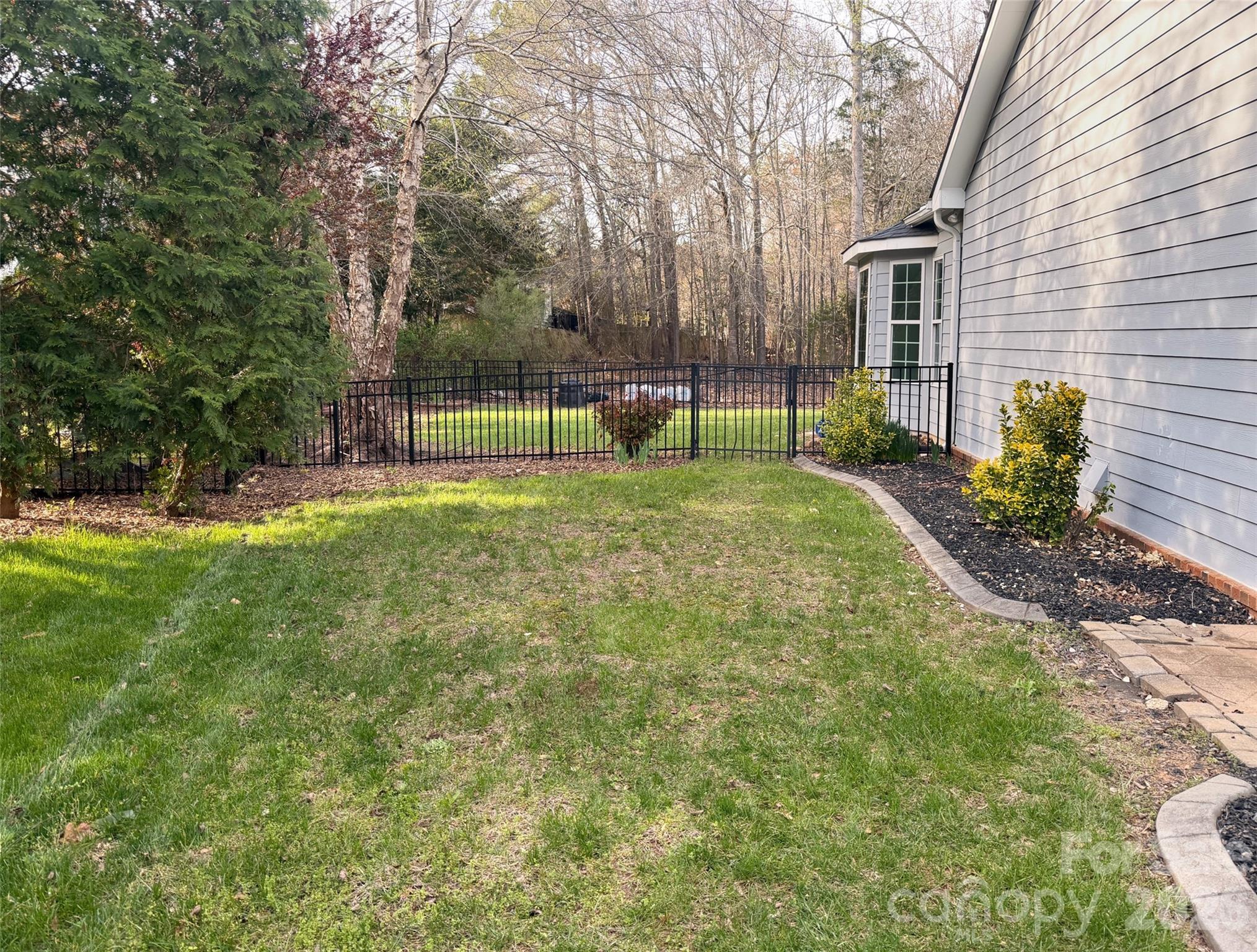 Fenced yard with so much space to enjoy the beautiful Carolina weather - 18465 E Marbella Lane, Fort Mill