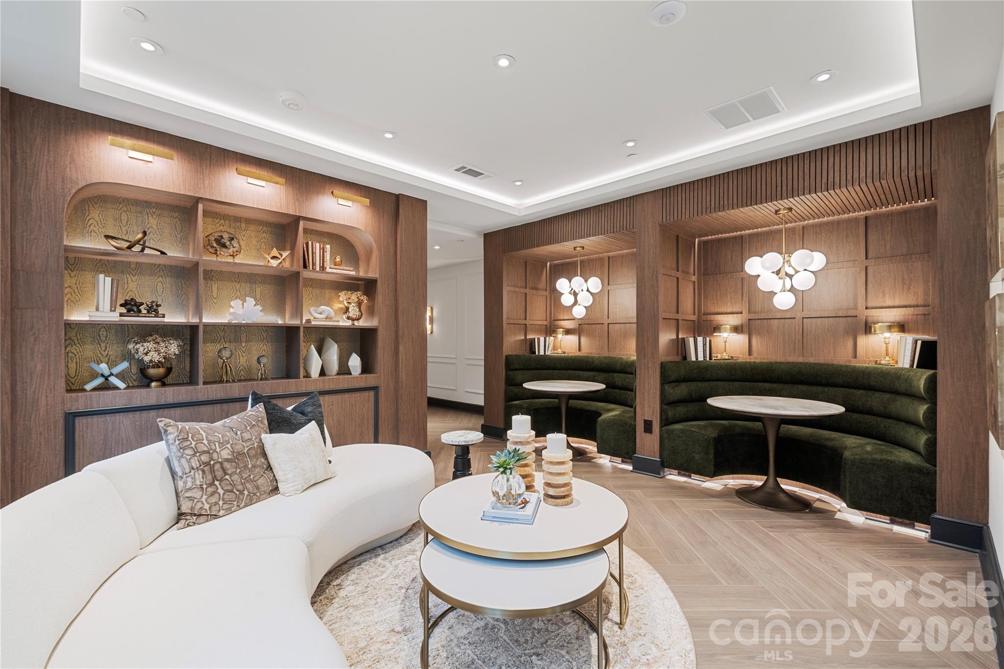 On the main floor, this welcoming entry foyer presents a cozy, contemporary and sophisticated space that sets the tone for the entire building, and a precursor to the spectacular and unique #503 above. - 409 Queens Road, Charlotte