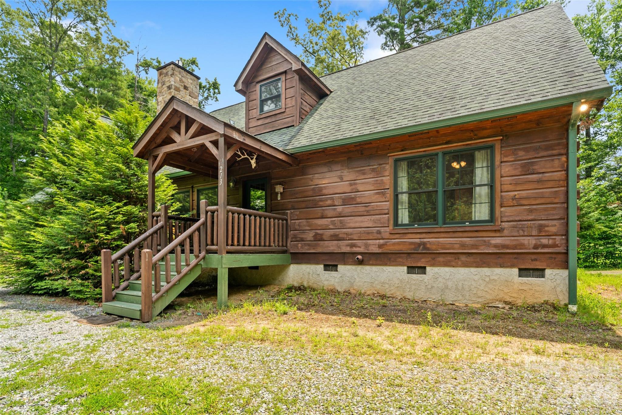 Incredibly scenic hiking and biking trails are right in your backyard, while the vibrant city culture of Asheville and the convenience of the Asheville Regional Airport are only a short drive away. - 213 Big Valley Road, Pisgah Forest