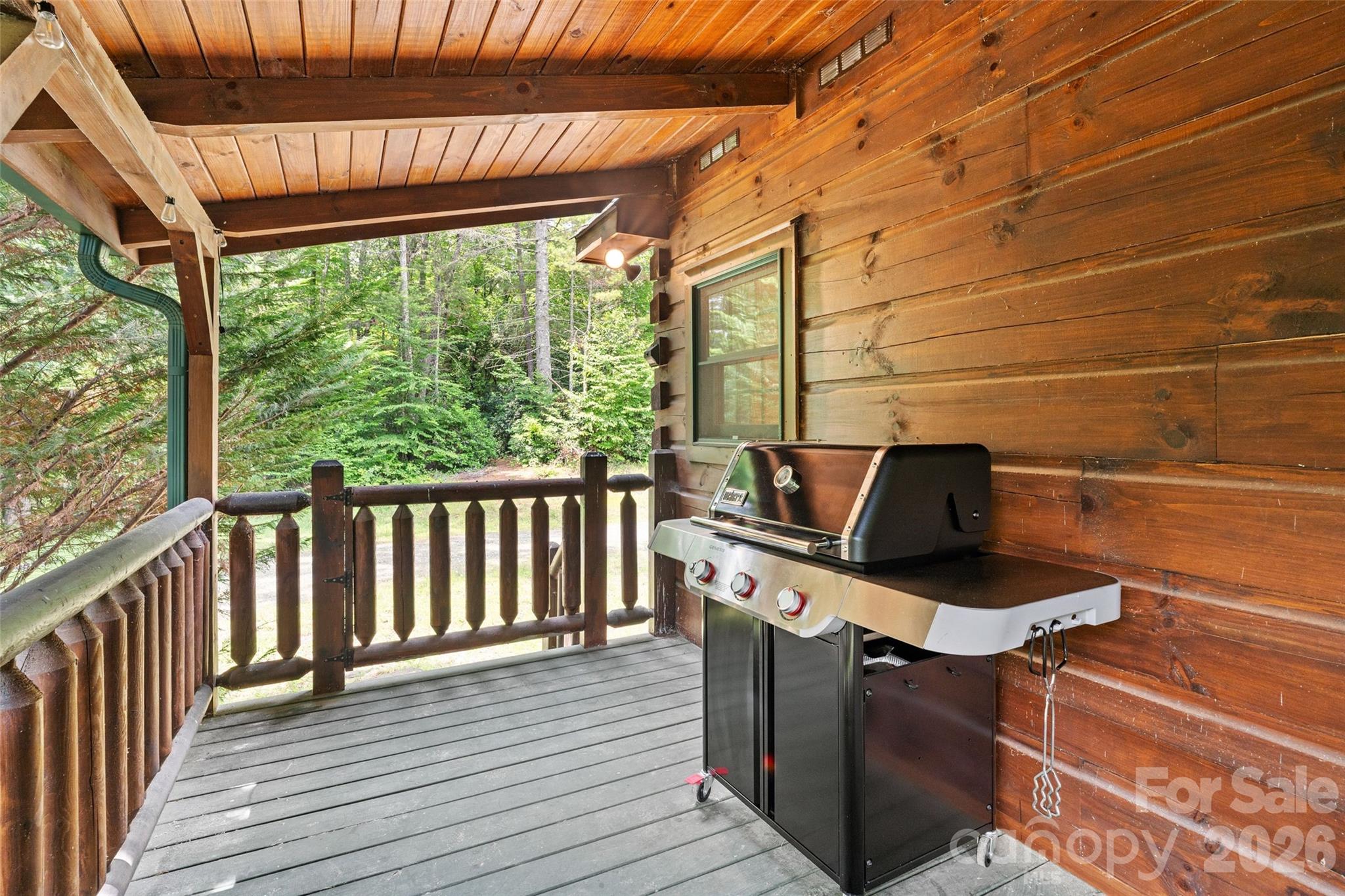 Covered outdoor grilling area with gorgeous woodland views. - 213 Big Valley Road, Pisgah Forest