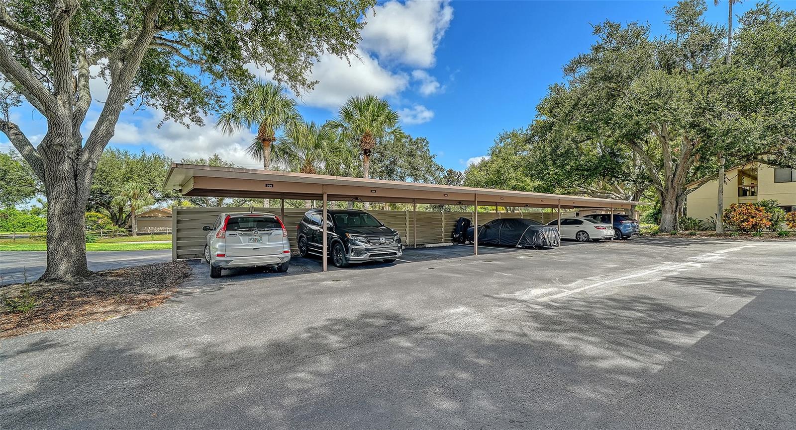 Covered parking spot - 740 WHITE PINE TREE RD #205, VENICE