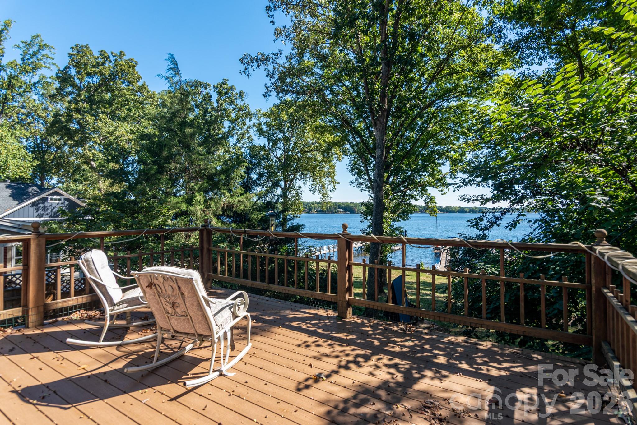 Back deck off main level with waterviews - 7889 Tradewinds Drive, Sherrills Ford