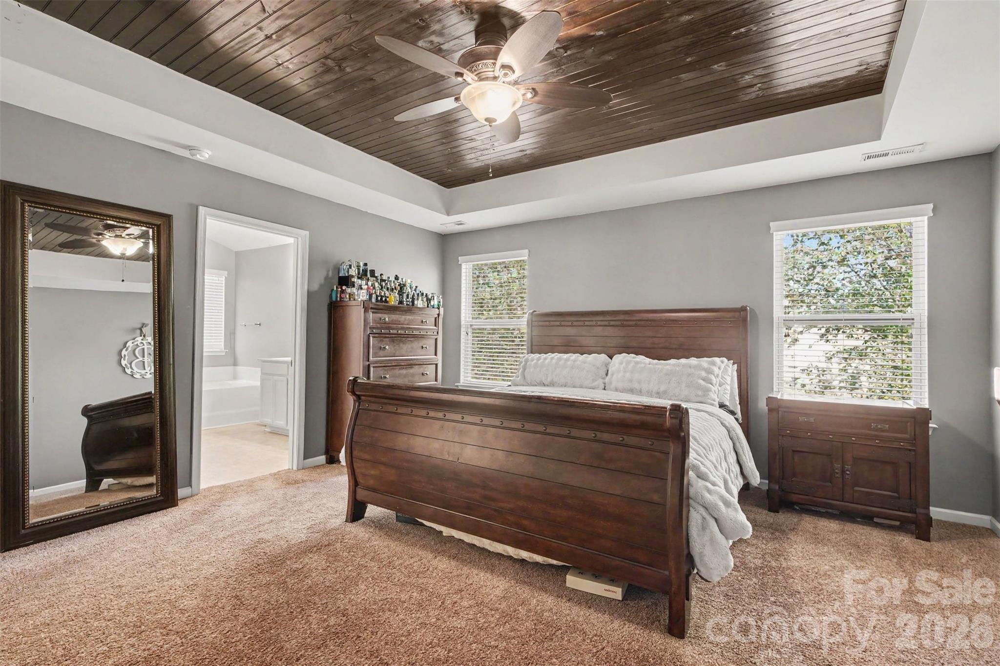 Primary suite with wood tray ceiling - 3324 Brackhill Street, Davidson