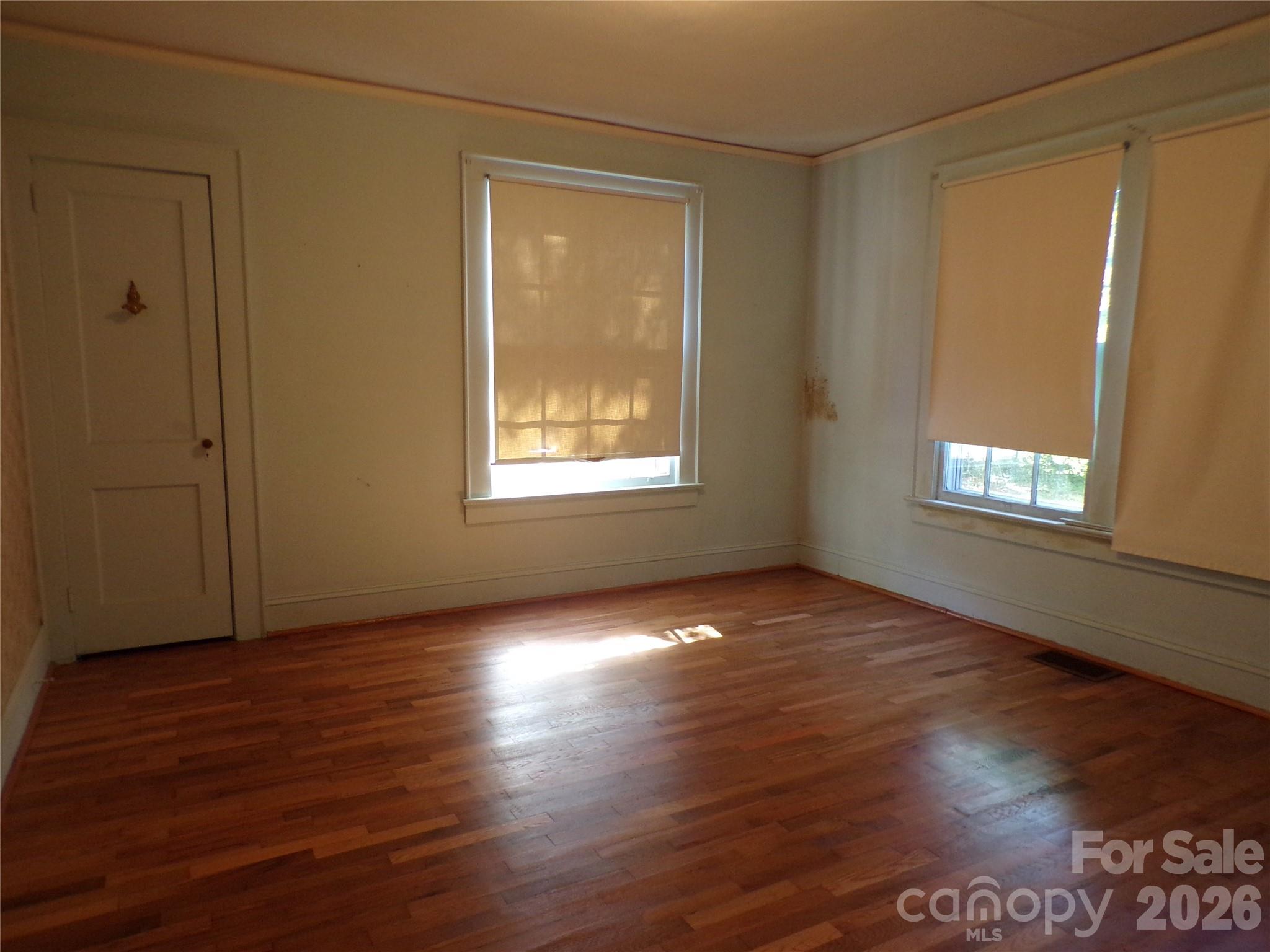 Bedroom Refinished Hardwood Flooring - 608 1st Street W, Conover