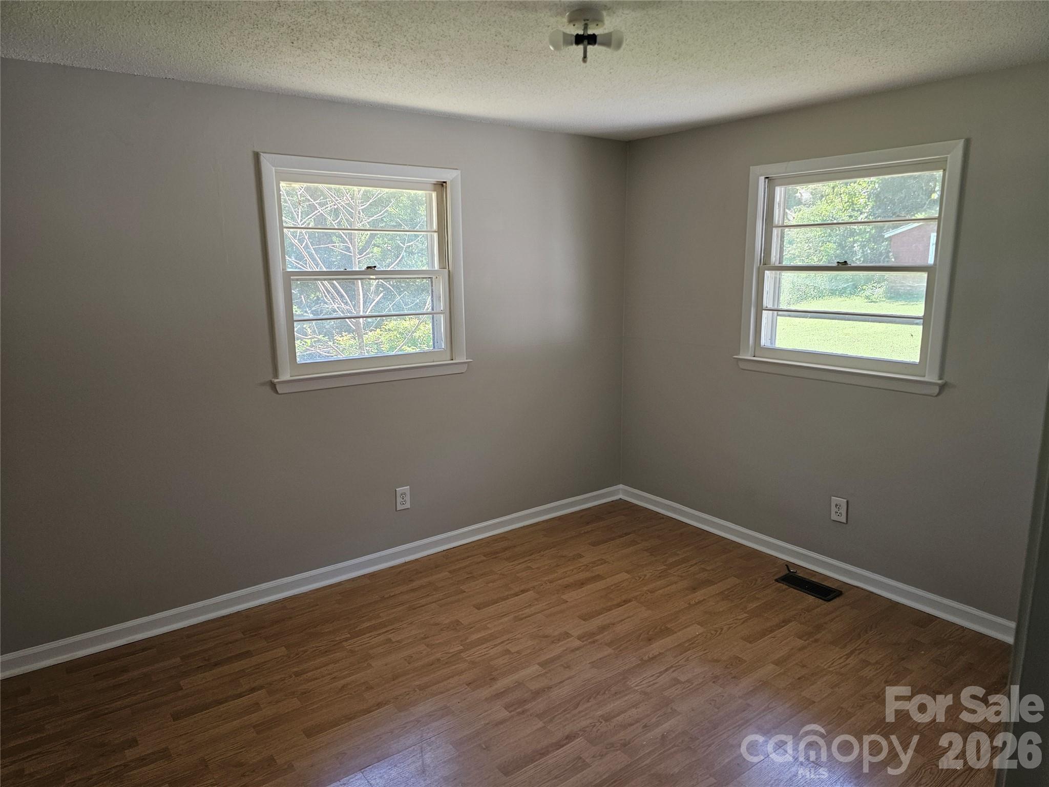 Primary bedroom with 1/2 bath - 2782 West View Street, Hickory