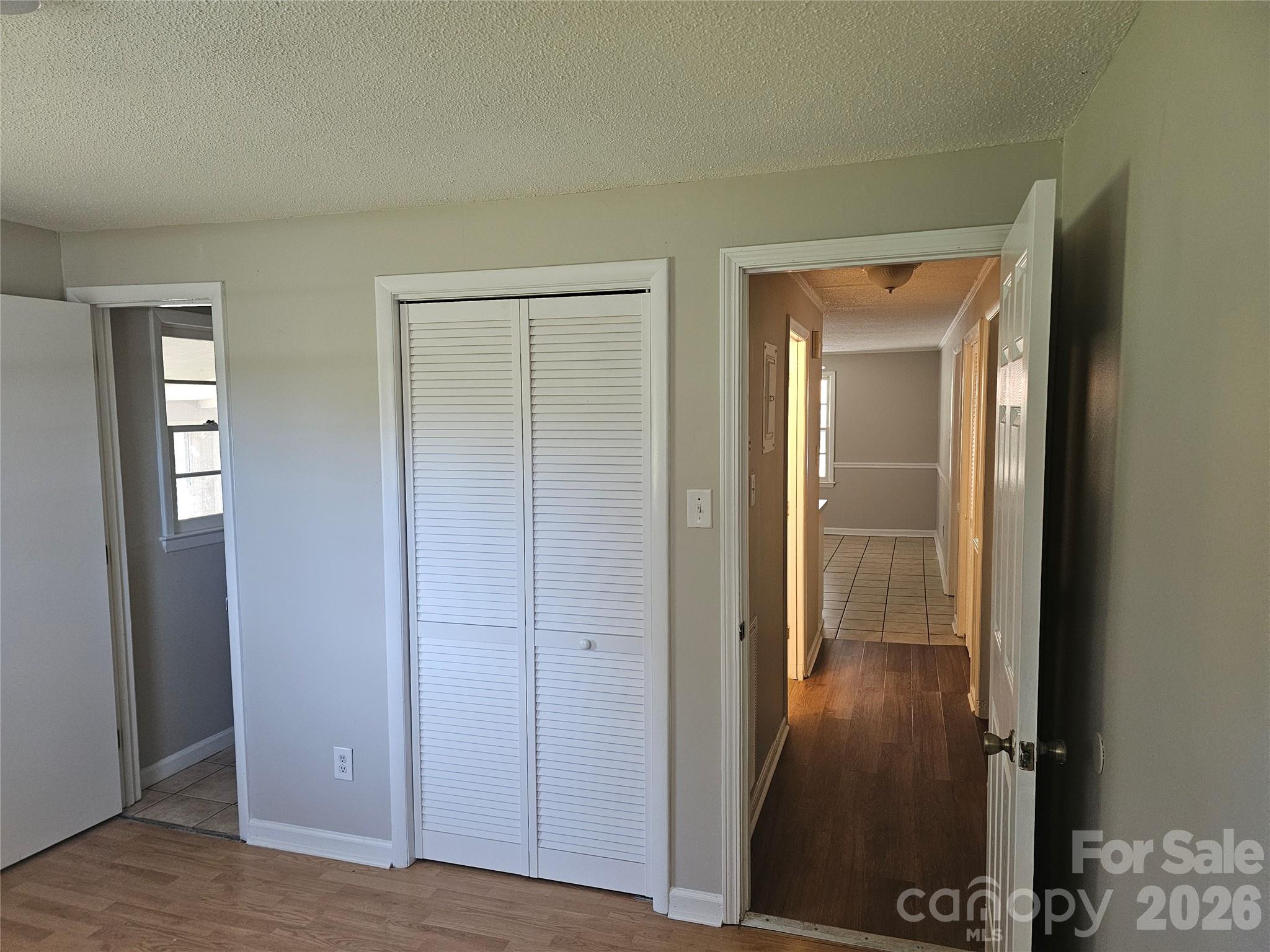 Primary bedroom with 1/2 bath - 2782 West View Street, Hickory