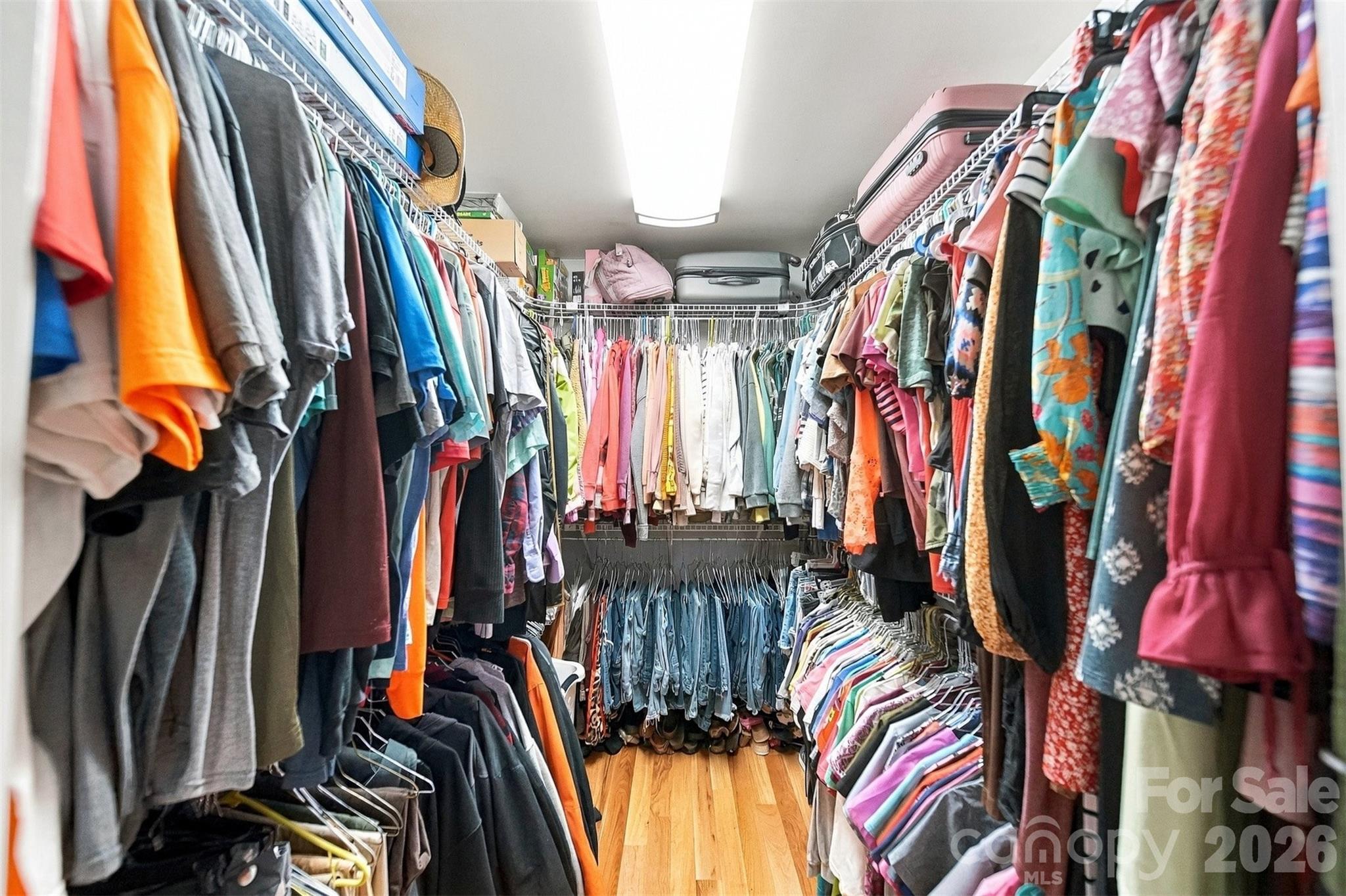 Walk-in closet primary bedroom. - 2094 South Fork Drive, Morganton