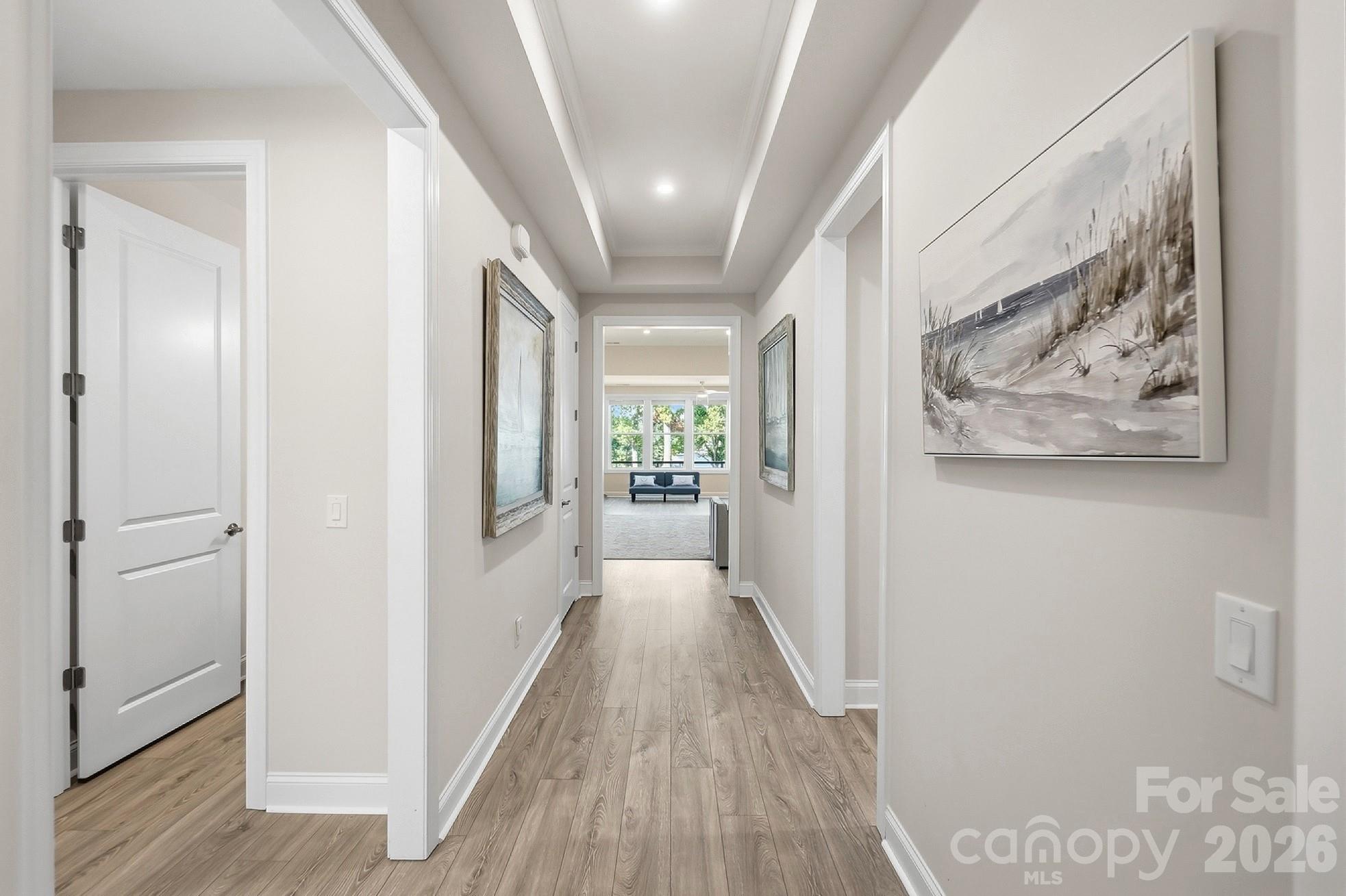 You'll love the inviting open floorplan designed for both everyday living and entertaining boasting Luxury vinyl flooring, rich molding, 10 foot ceilings, and 8 foot doors - 8032 Longwaters Court, York
