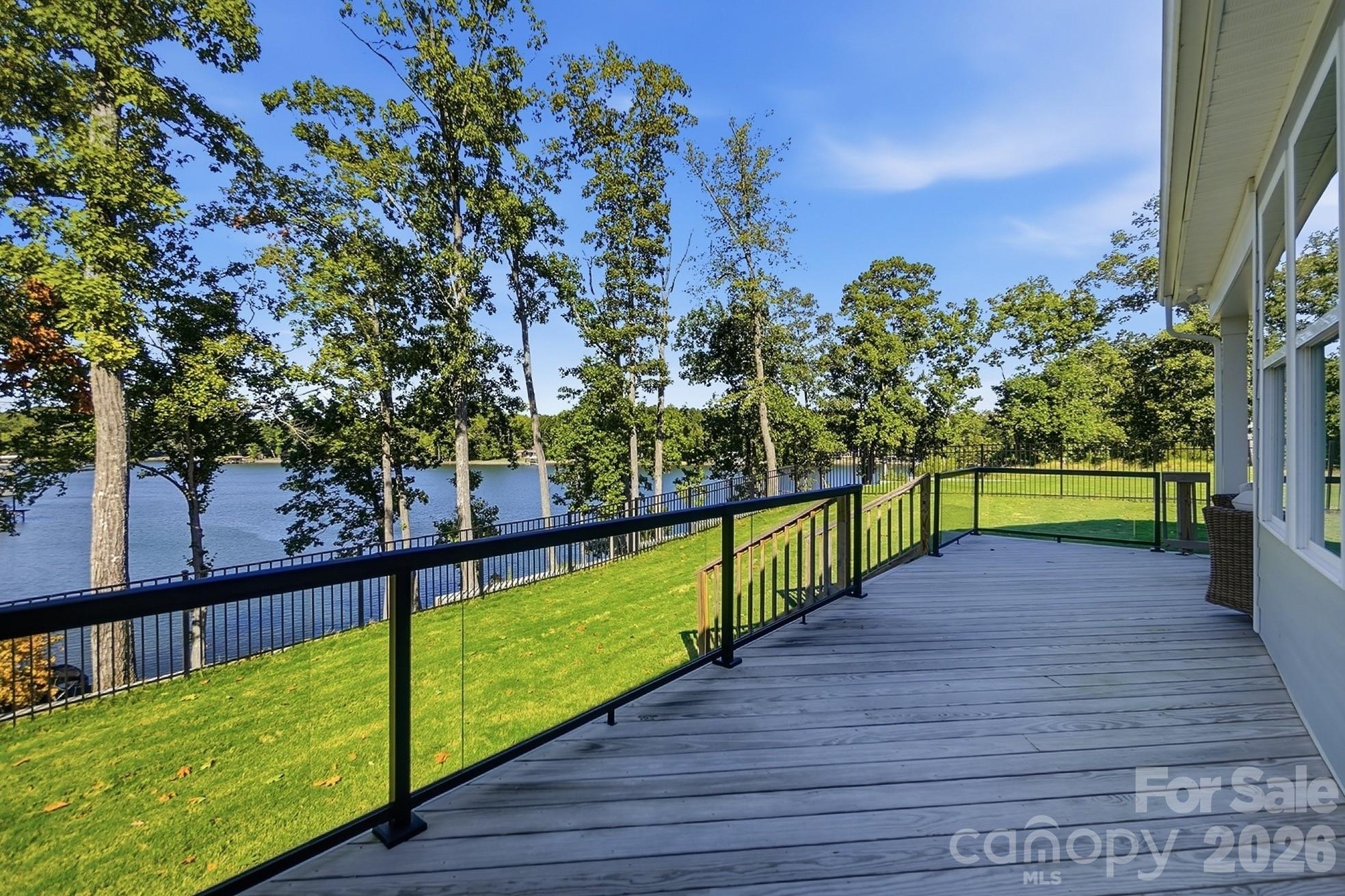 Deck with glass panels for unobstructed water views - 8032 Longwaters Court, York