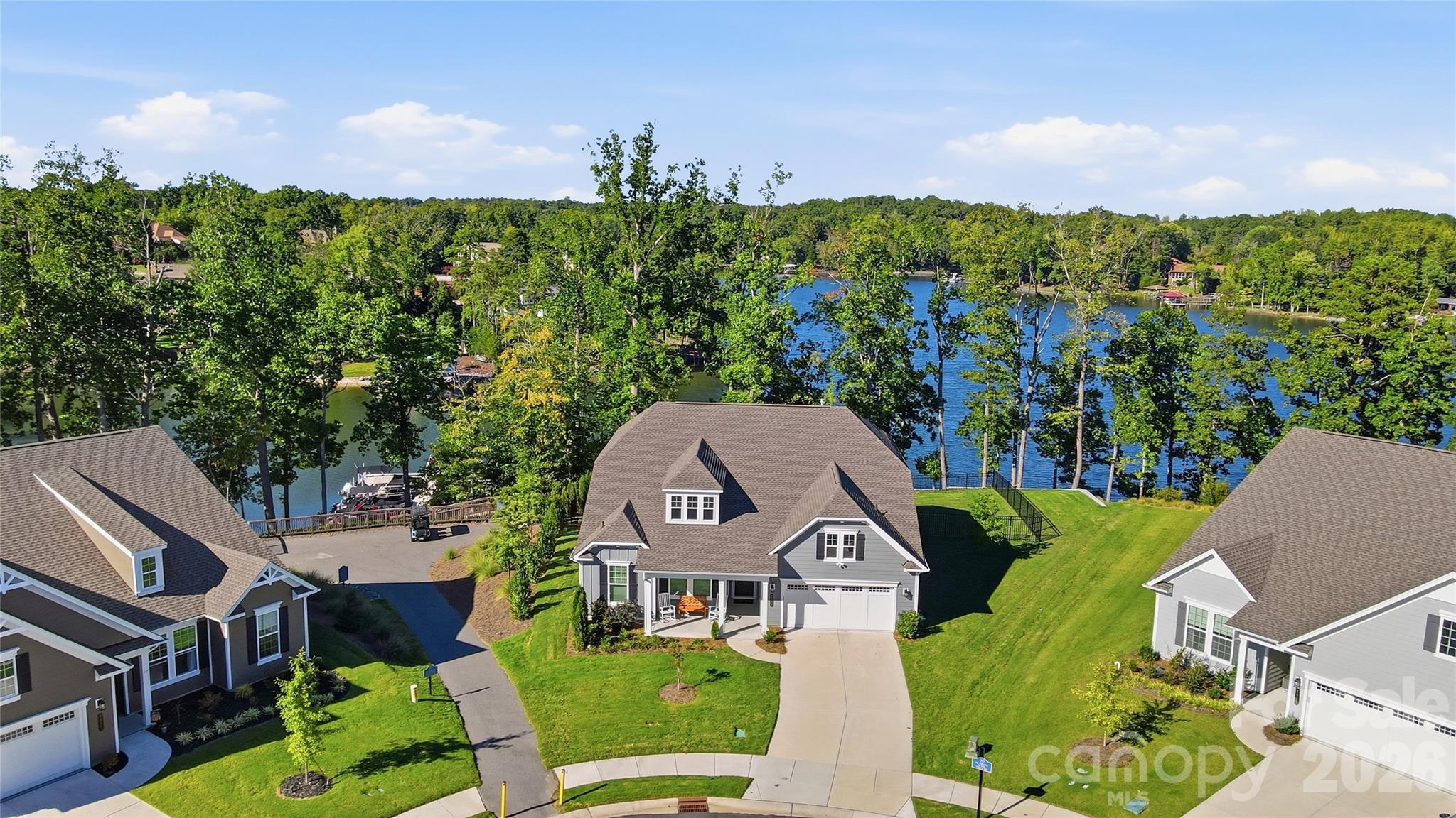This lovely home has attic space above the garage, Tesla EV charger, and generator prepped to electric panel - 8032 Longwaters Court, York
