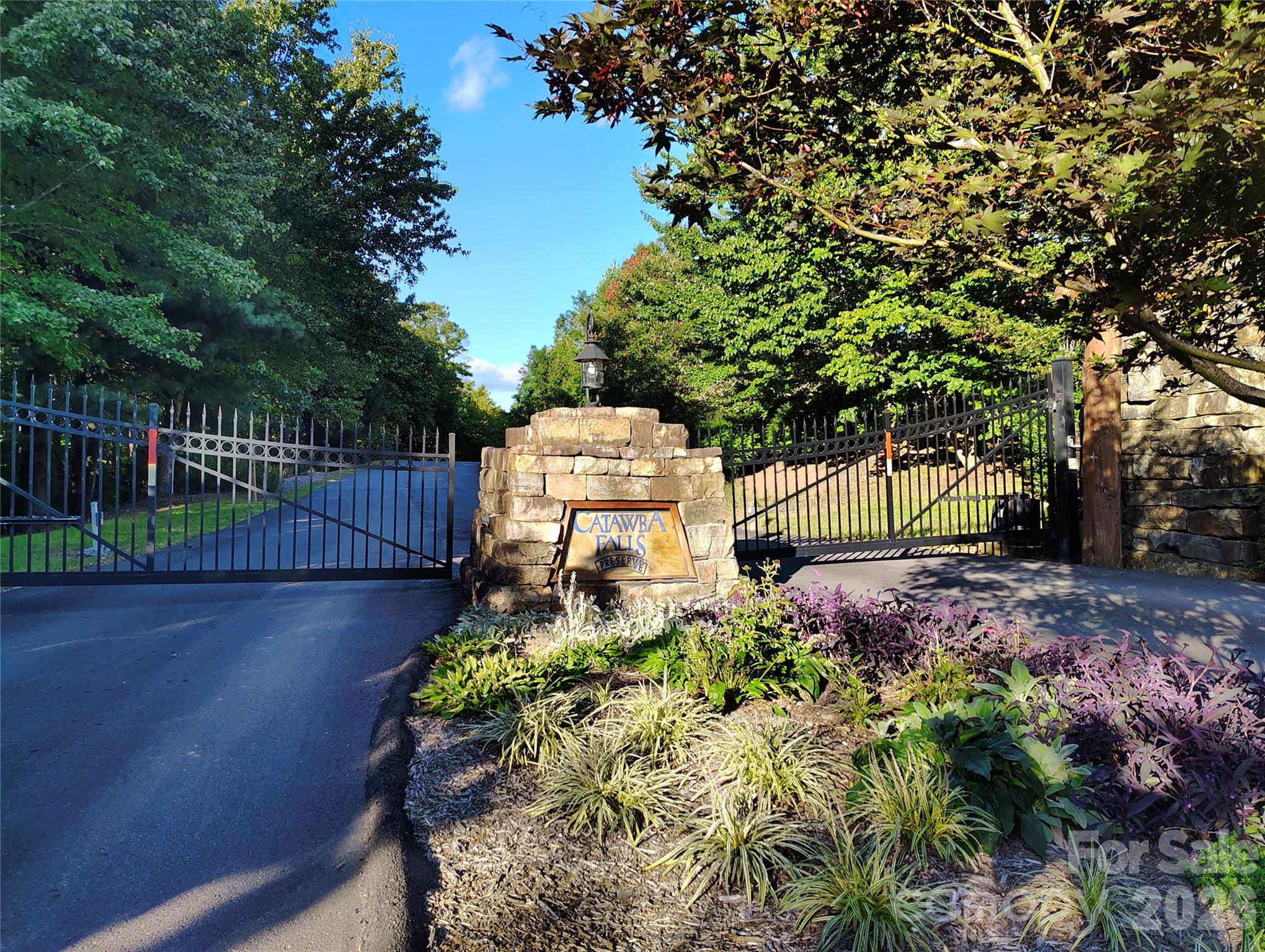 Beautiful gate and landscaping - 0000 Cheyenne Falls Trail, Old Fort