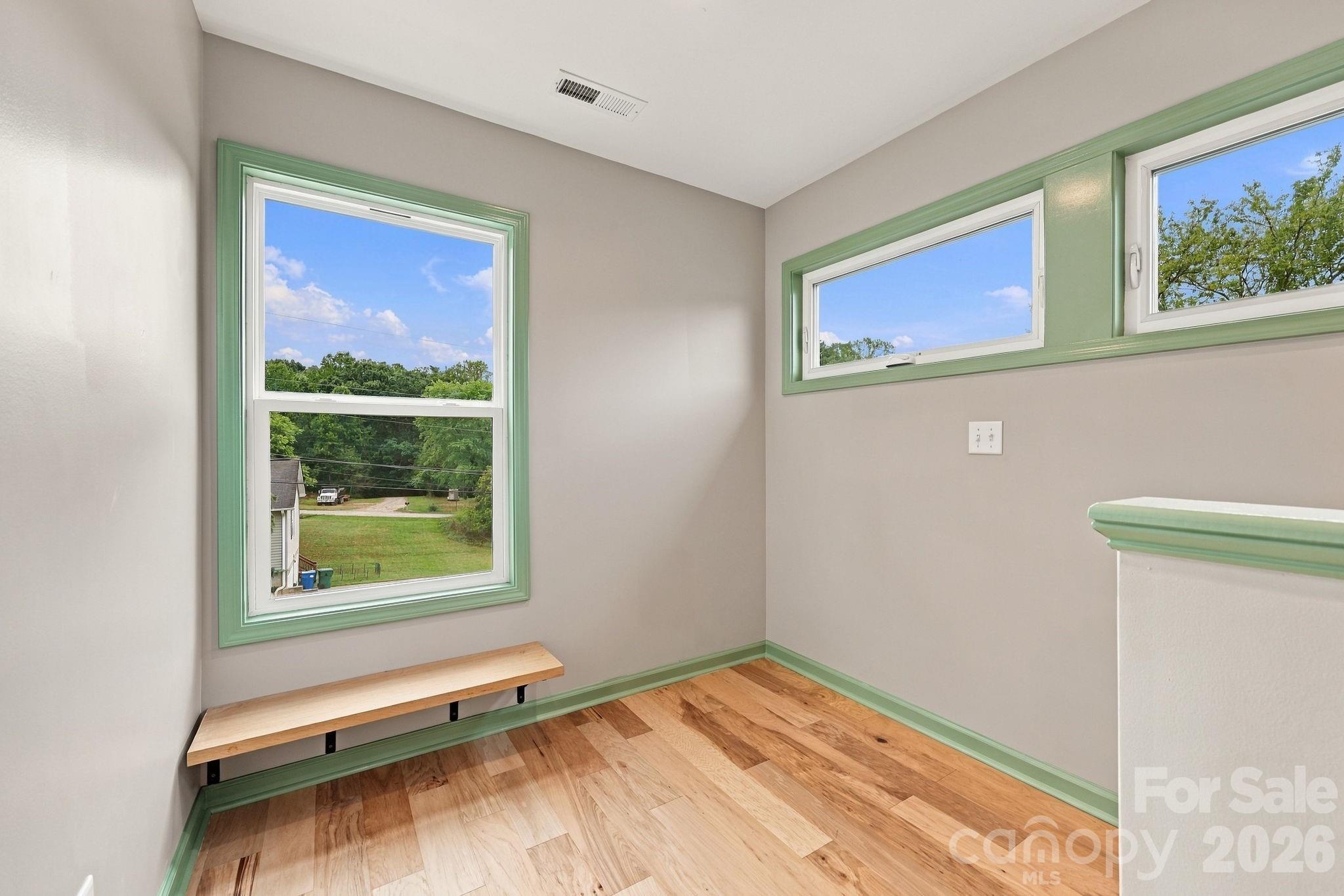 Upstairs landing and plant shelf - 34 Gudger Road, Candler