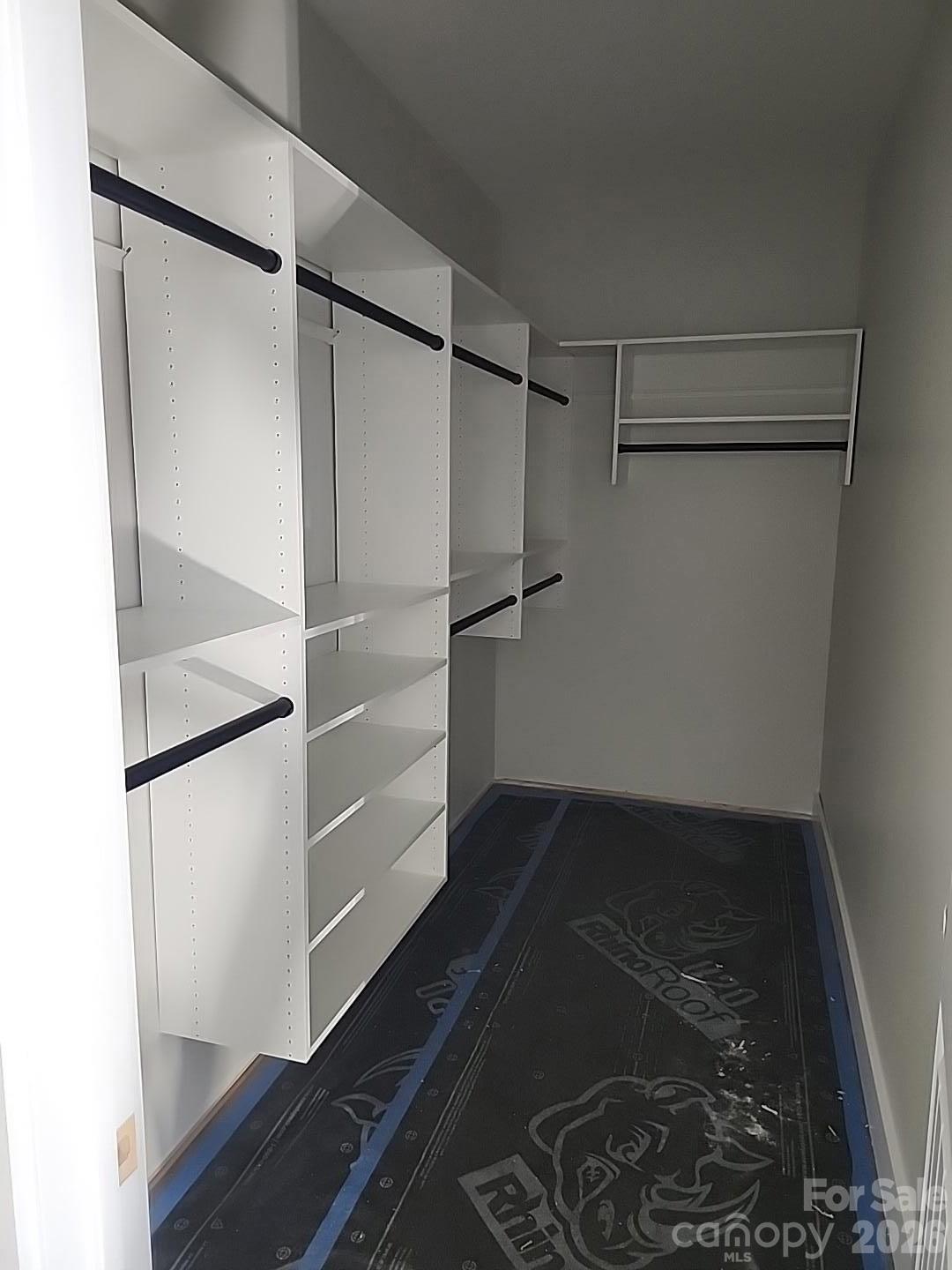Primary bedroom custom closet - 1895 Knolls Drive, Newton