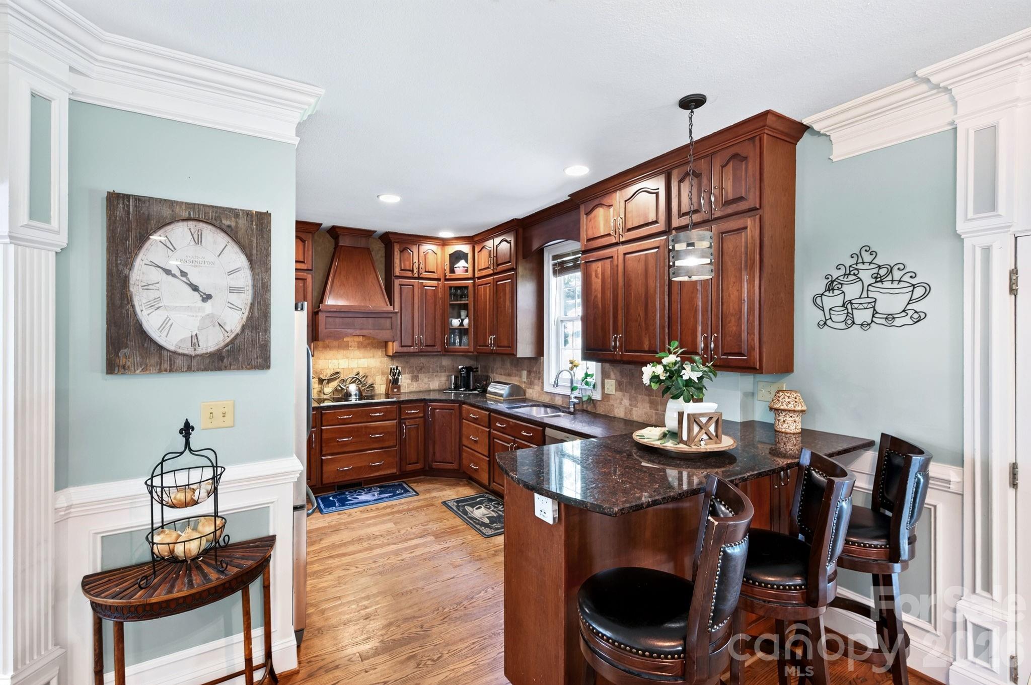 Kitchen with Peninsula Seating - 73 Rose Of Sharon Way, Candler