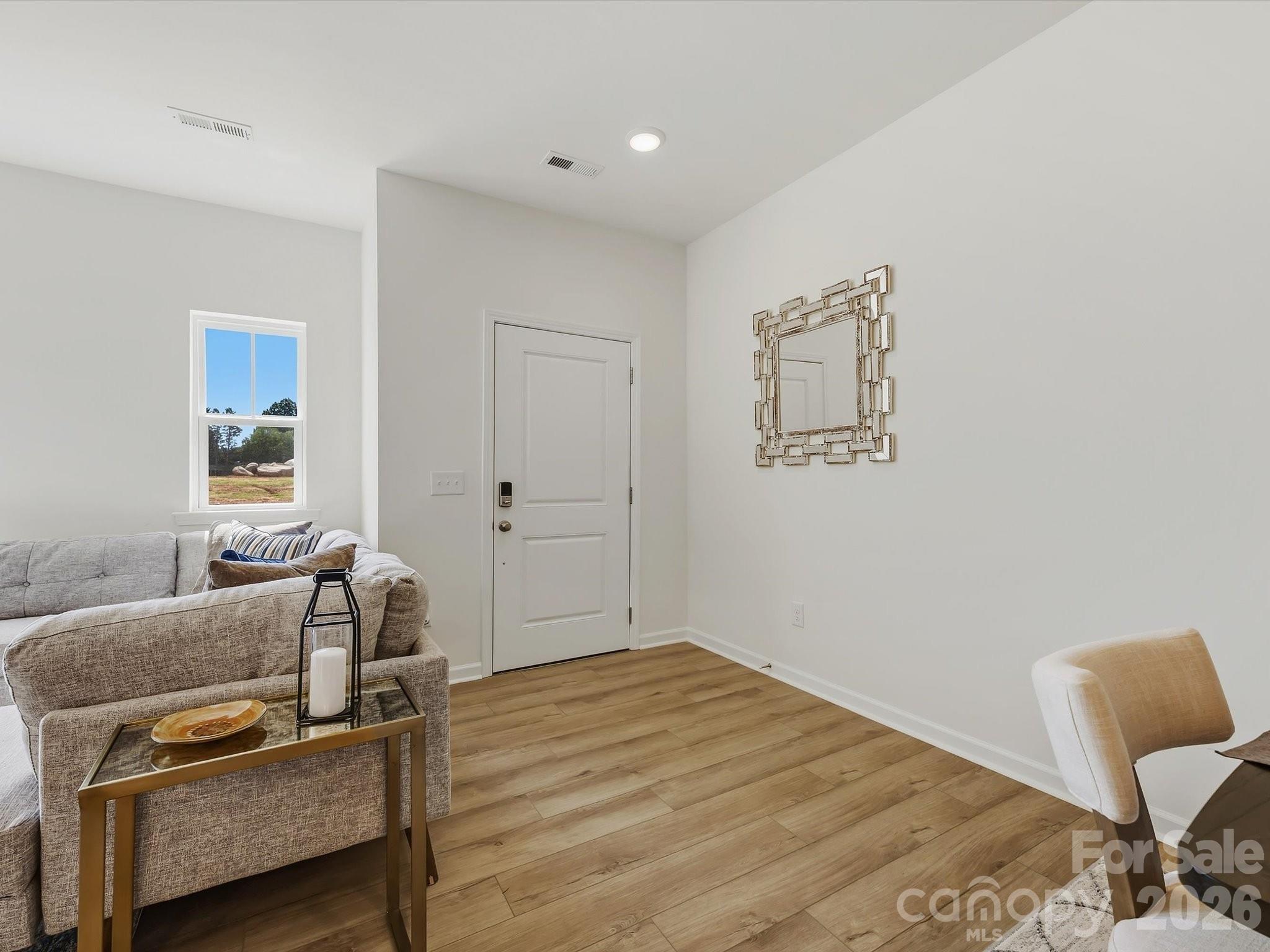 Rendering of Home Staged to Show Placement of Furniture - 6565 Fire Lily Lane, Charlotte