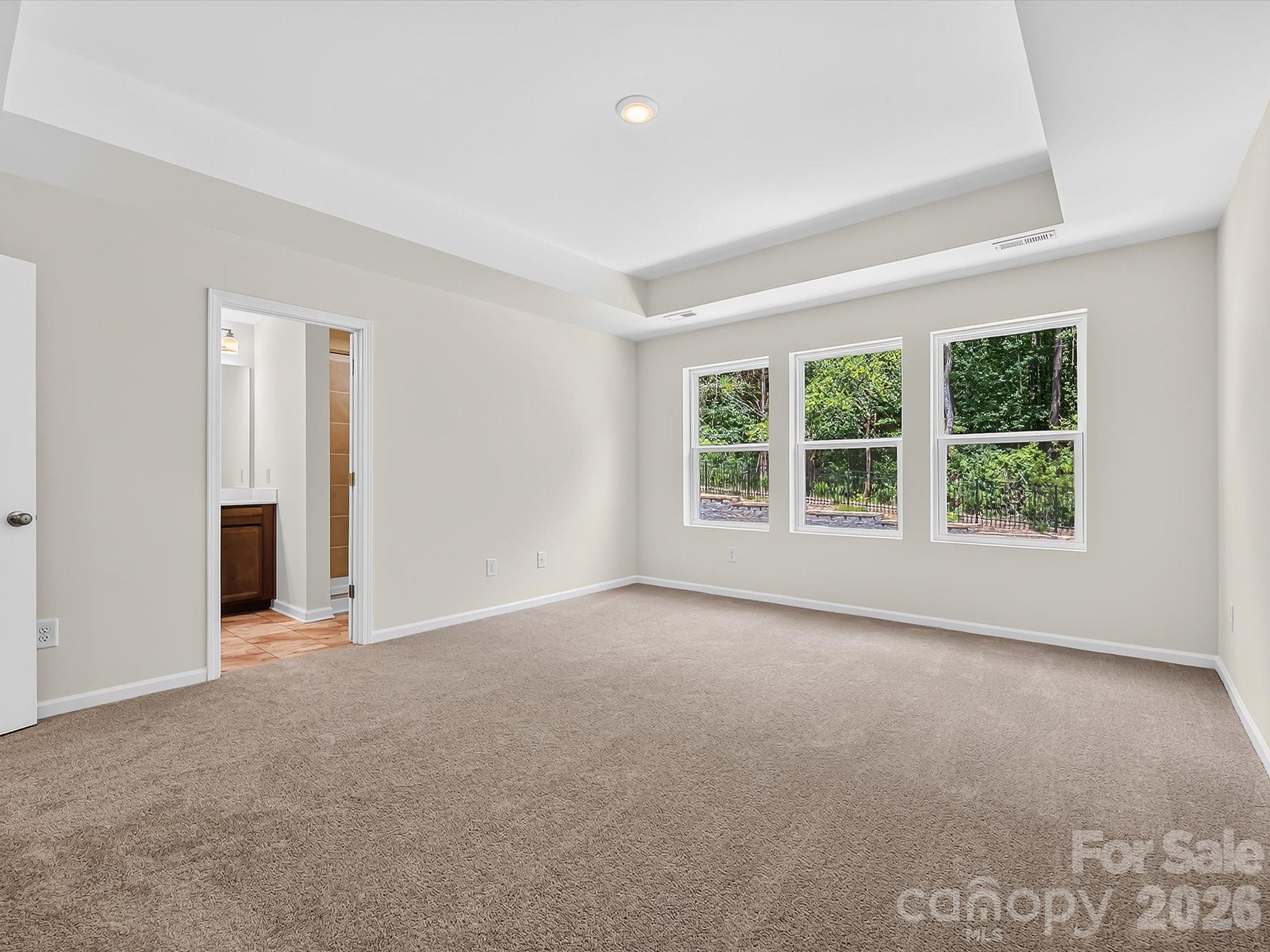 An Abundance of Natural Light in Owner's Suite - 6565 Fire Lily Lane, Charlotte