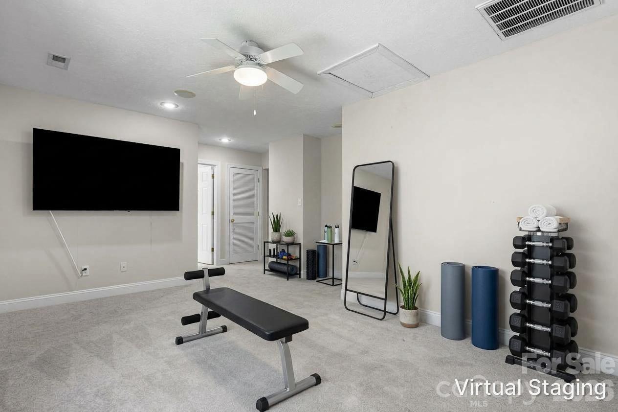 Staged exercise  room - 4746 Braxton Gate Lane, Hickory