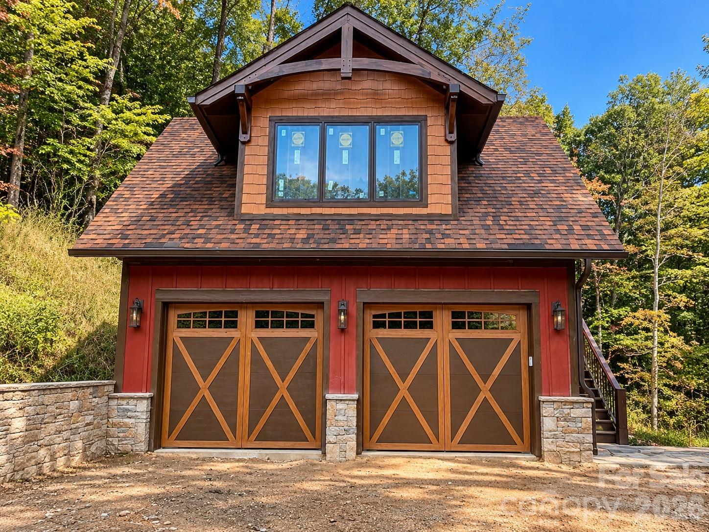 This home that has previously been built from the same floor plan has a detached garage (buyers can upgrade to build a finished room over the garage). - 30 Finlaystone Trace, Waynesville
