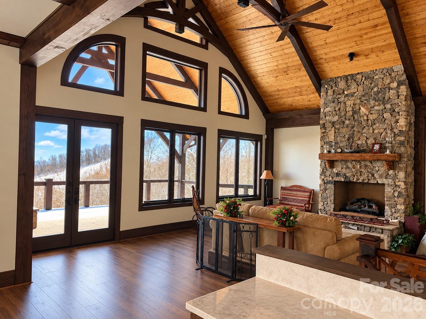 Open living space with big windows with this floorplan. - 30 Finlaystone Trace, Waynesville