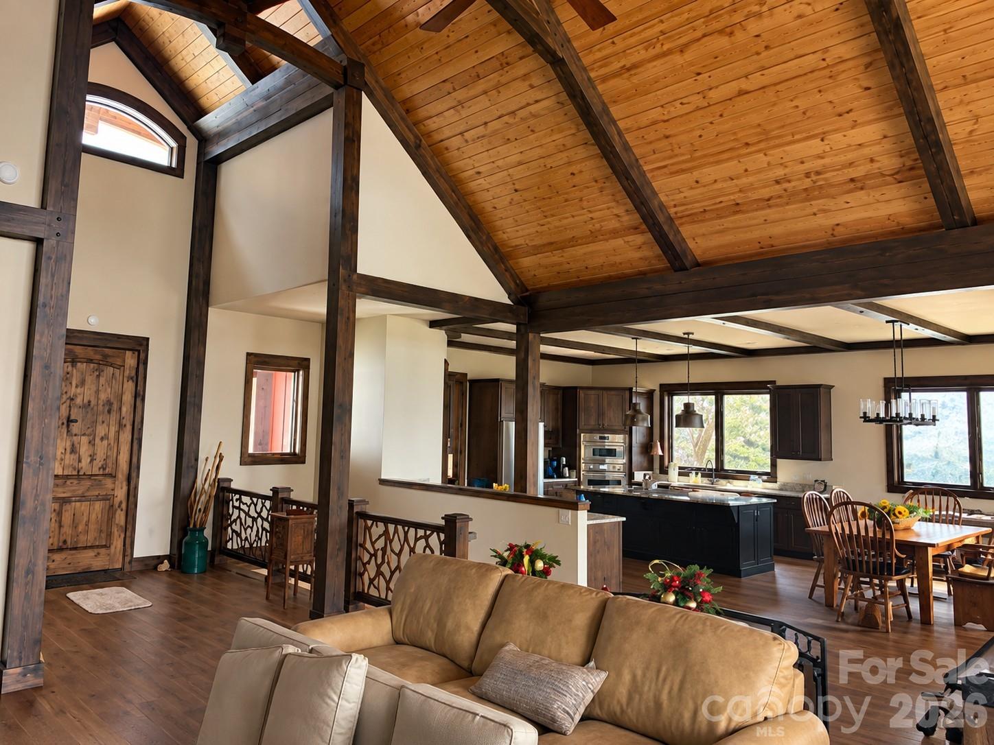 Open floor plan with the kitchen overlooking the family room with this floorplan. - 30 Finlaystone Trace, Waynesville