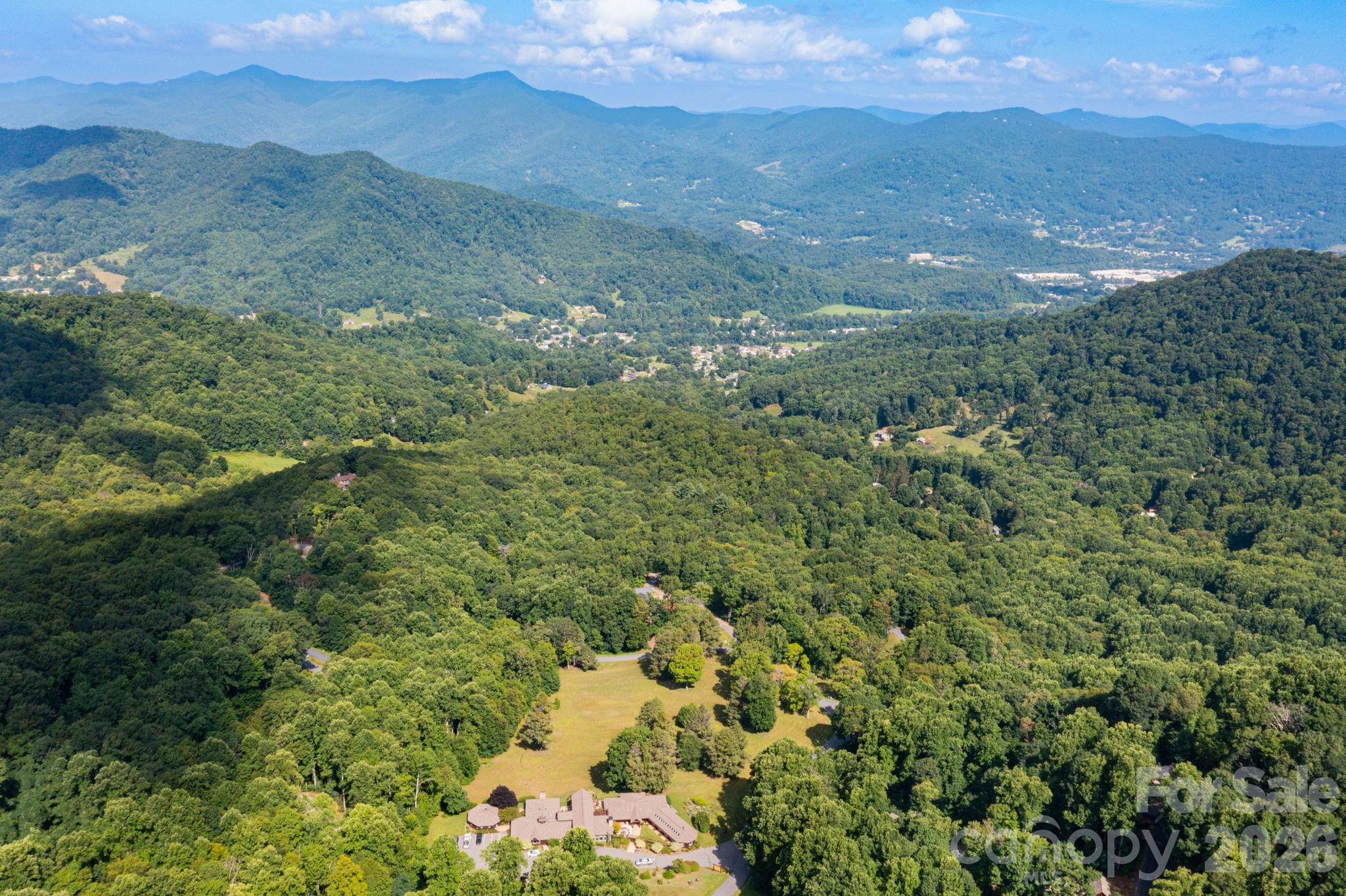 Drone footage of clubhouse and neighborhood. - 30 Finlaystone Trace, Waynesville