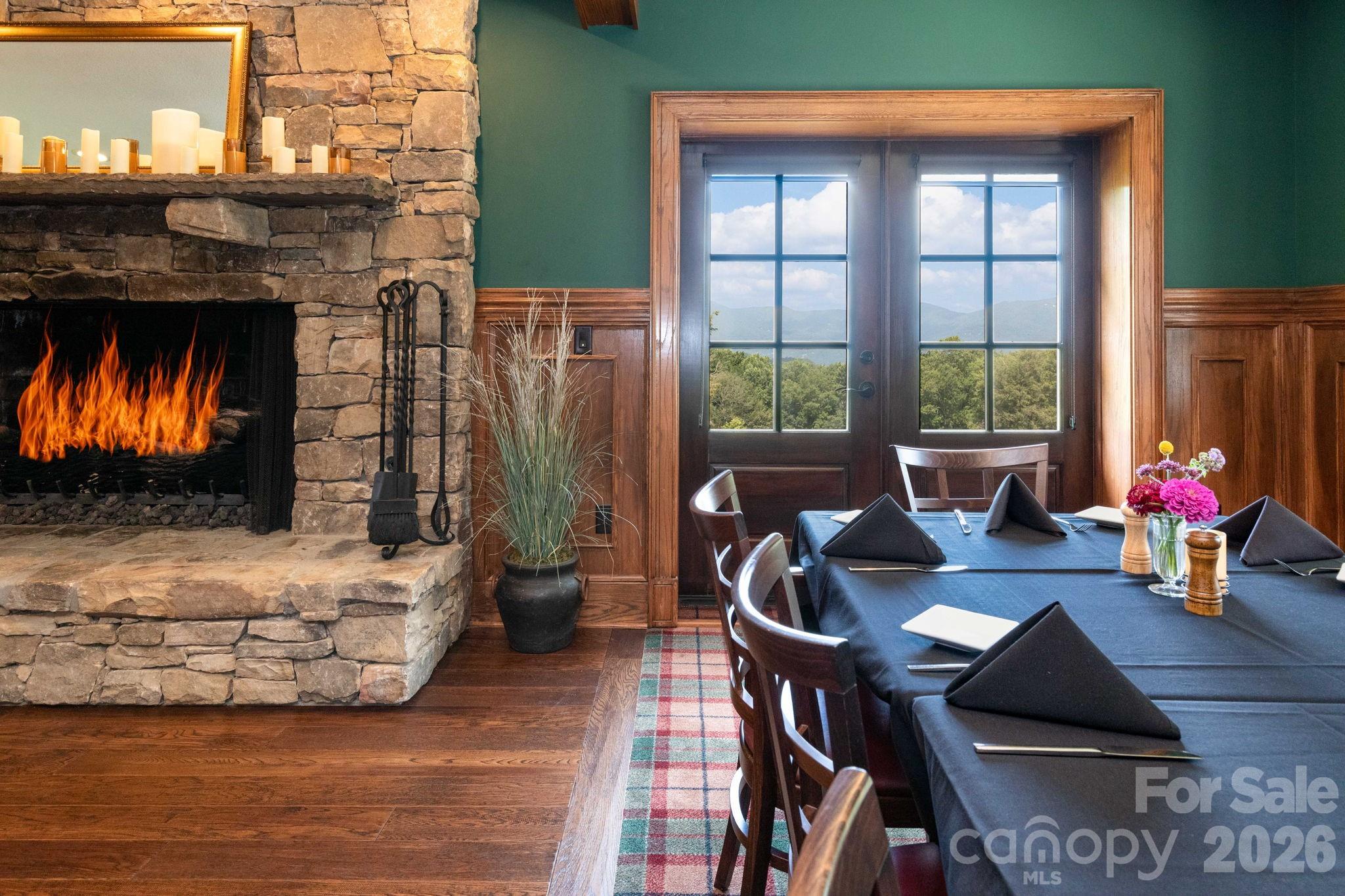 Dining by the fire. - 30 Finlaystone Trace, Waynesville