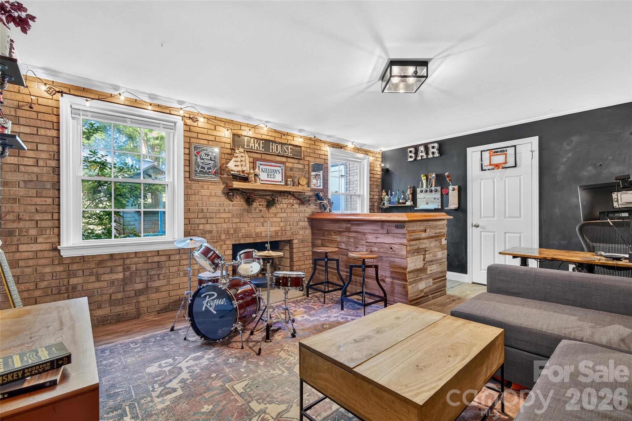 Bar area and fireplace - 19916 Floral Lane, Cornelius