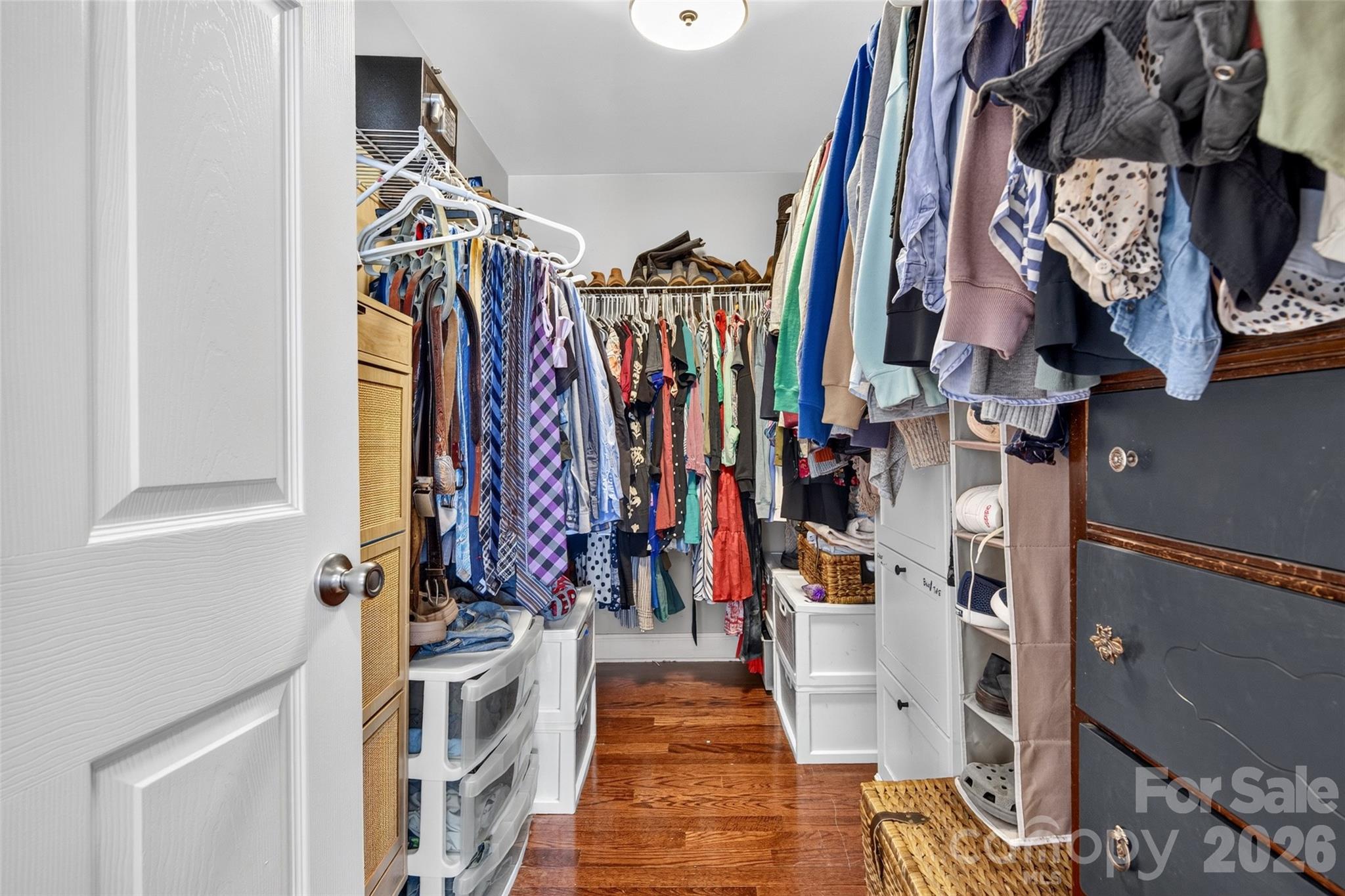 Primary walk in closet - 19916 Floral Lane, Cornelius
