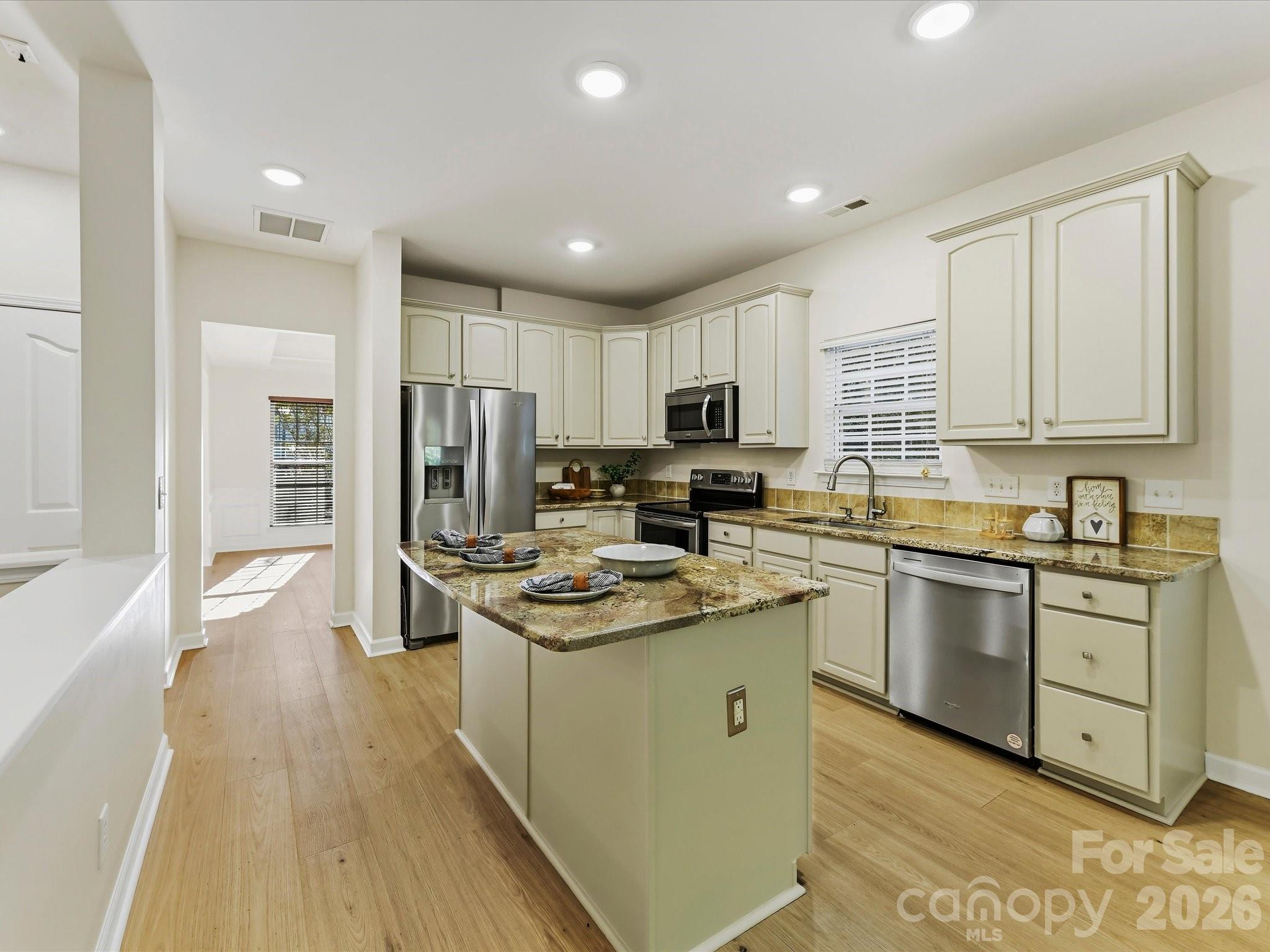 The open Kitchen to great room design will appeal - 8128 Madrigal Court, Waxhaw