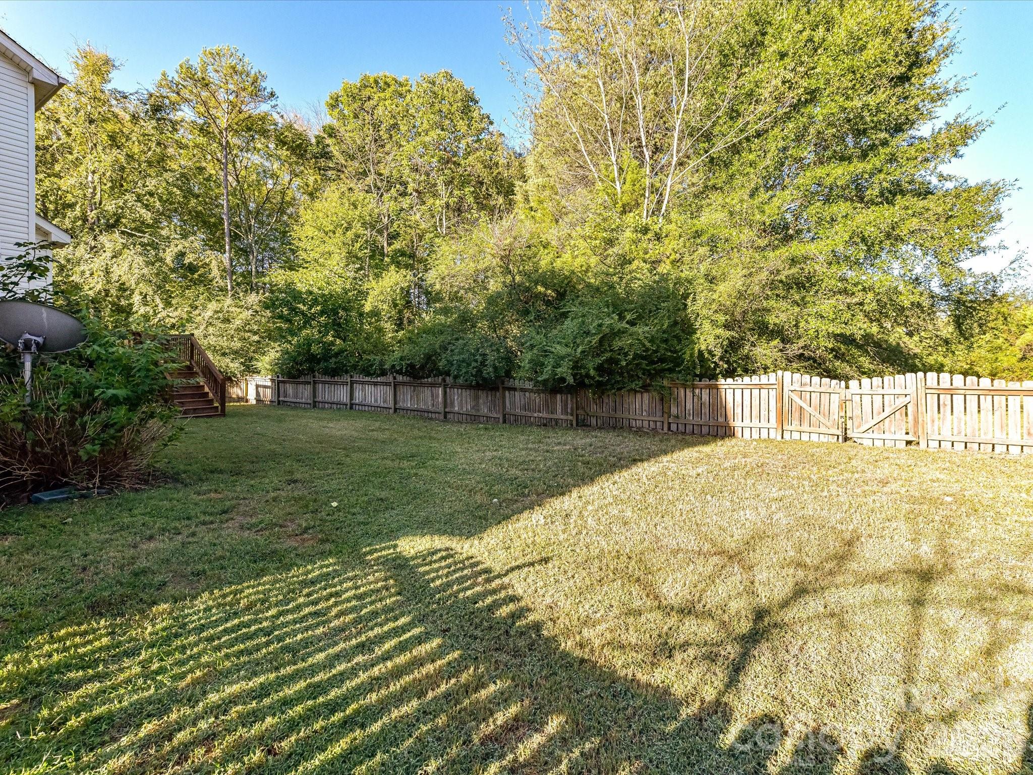 Deep, fenced yard and this is only about 1/4 of it! - 8128 Madrigal Court, Waxhaw