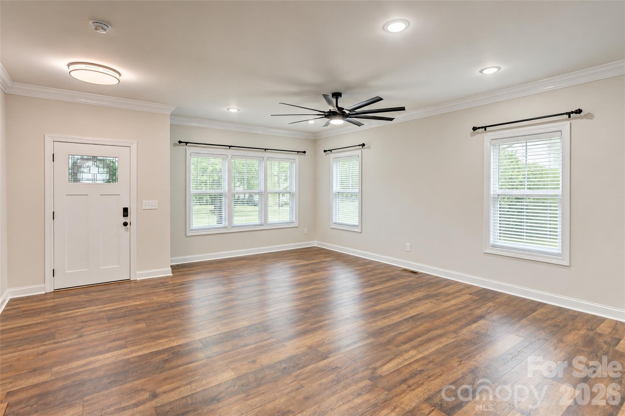 Step inside the front door onto this gorgeous laminate wood flooring stretching almost the entire house (no carpet here!) - 317 Oak Brook Drive, Salisbury