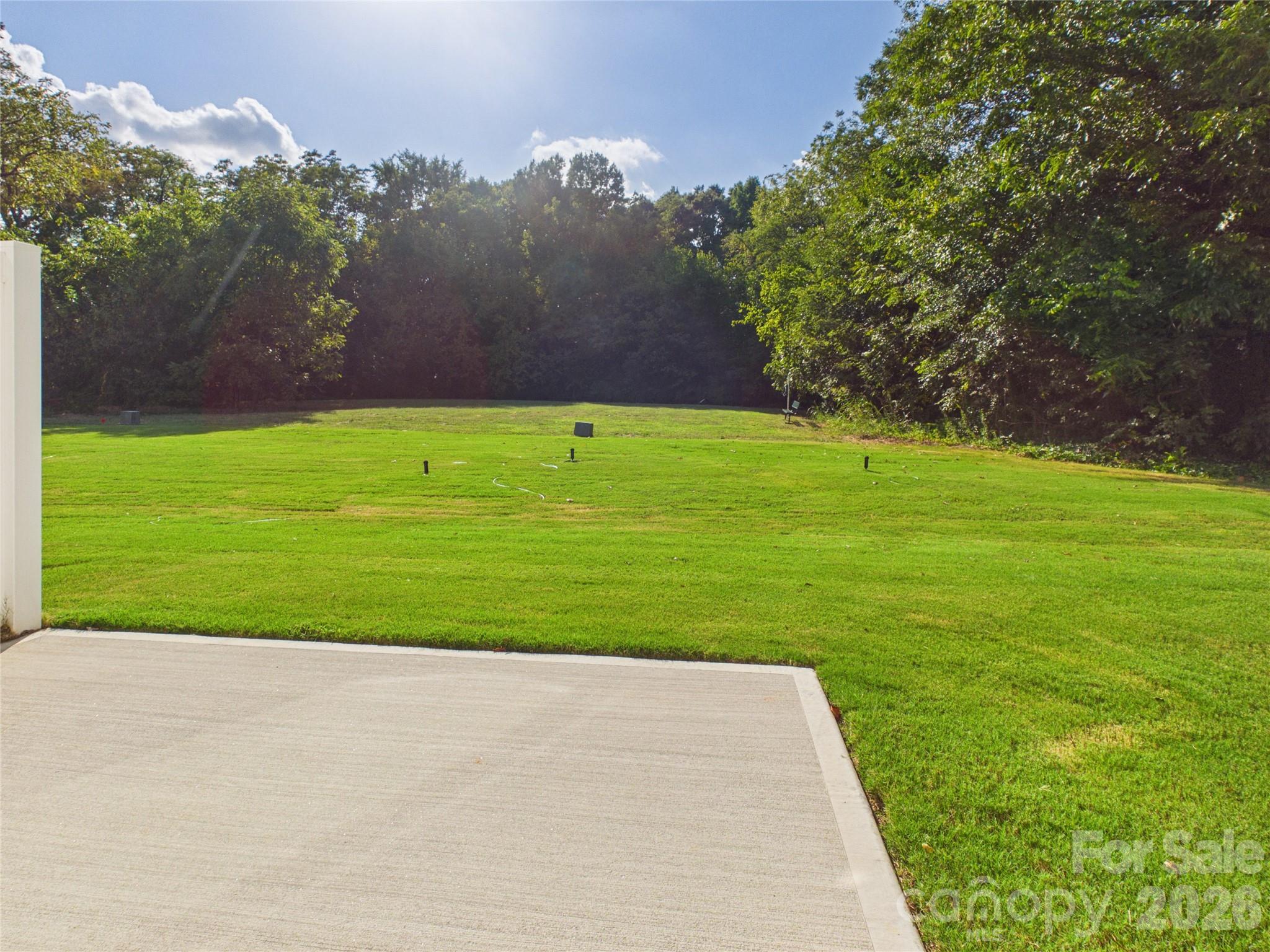 12x12 patio with privacy fence between units.  yard opens to the Common Open Space - 105 Dilling Street N, Kings Mountain