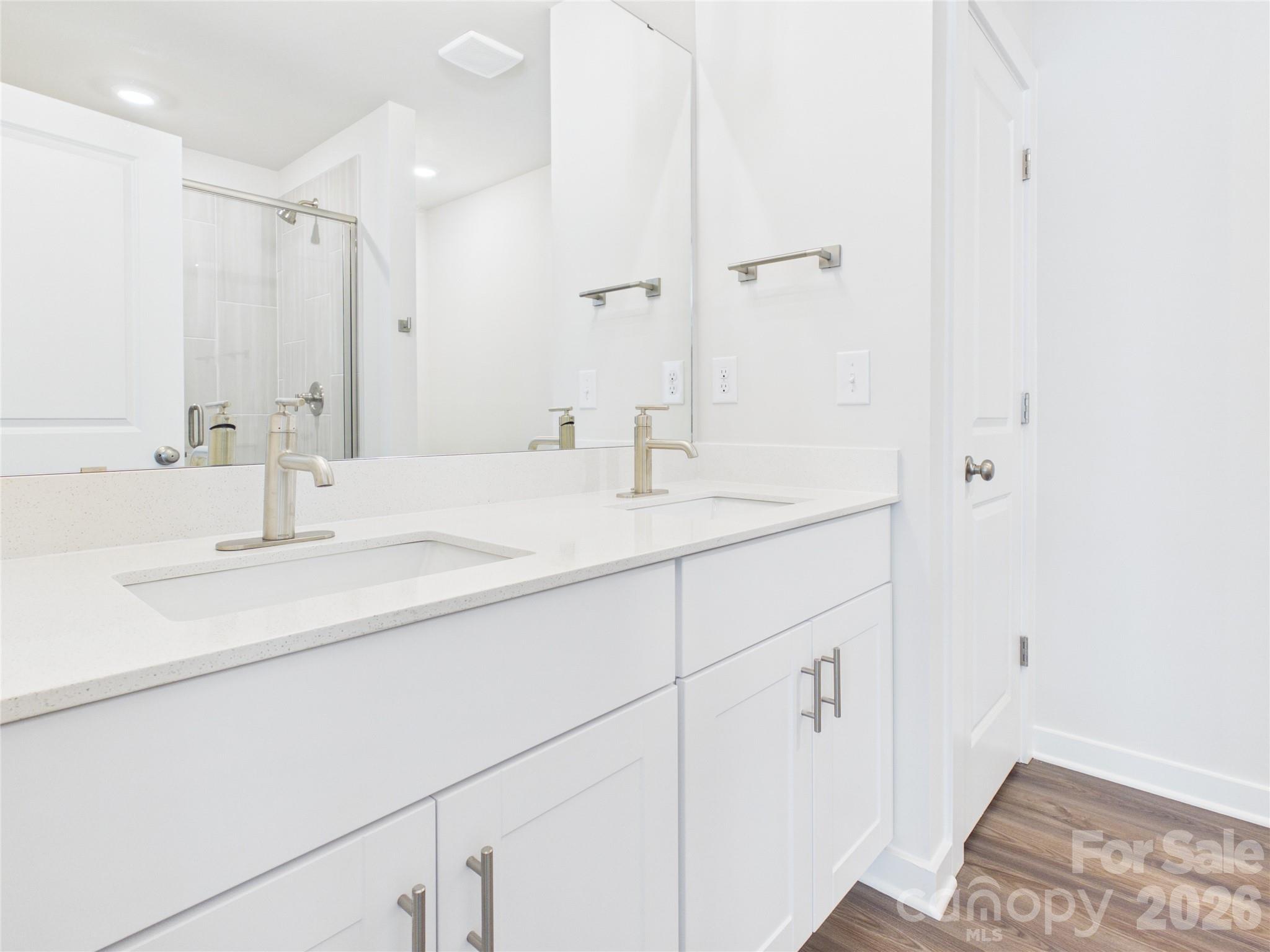 Hall bath dual sinks and linen closet for extra storage - 105 Dilling Street N, Kings Mountain