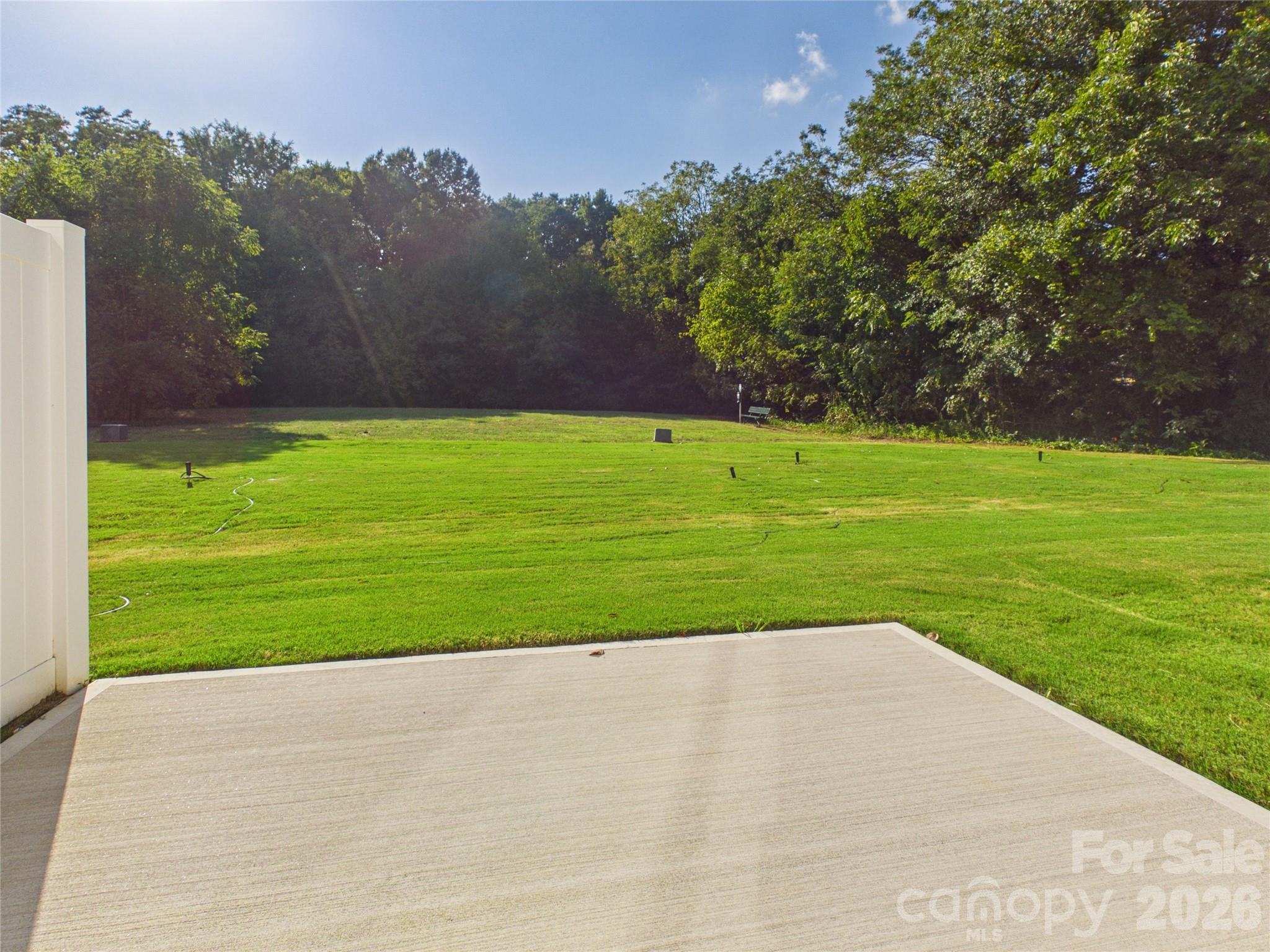 12x12 patio opens to large common open space. - 105 Dilling Street N, Kings Mountain