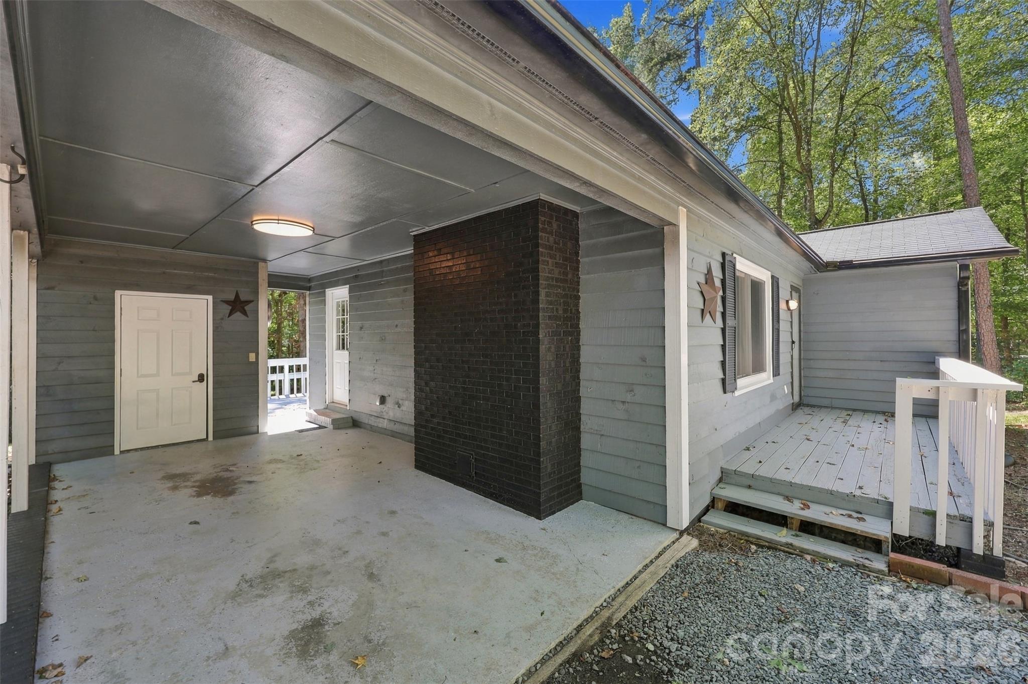Car port with locked storage space - 2909 Matoka Trail, Matthews