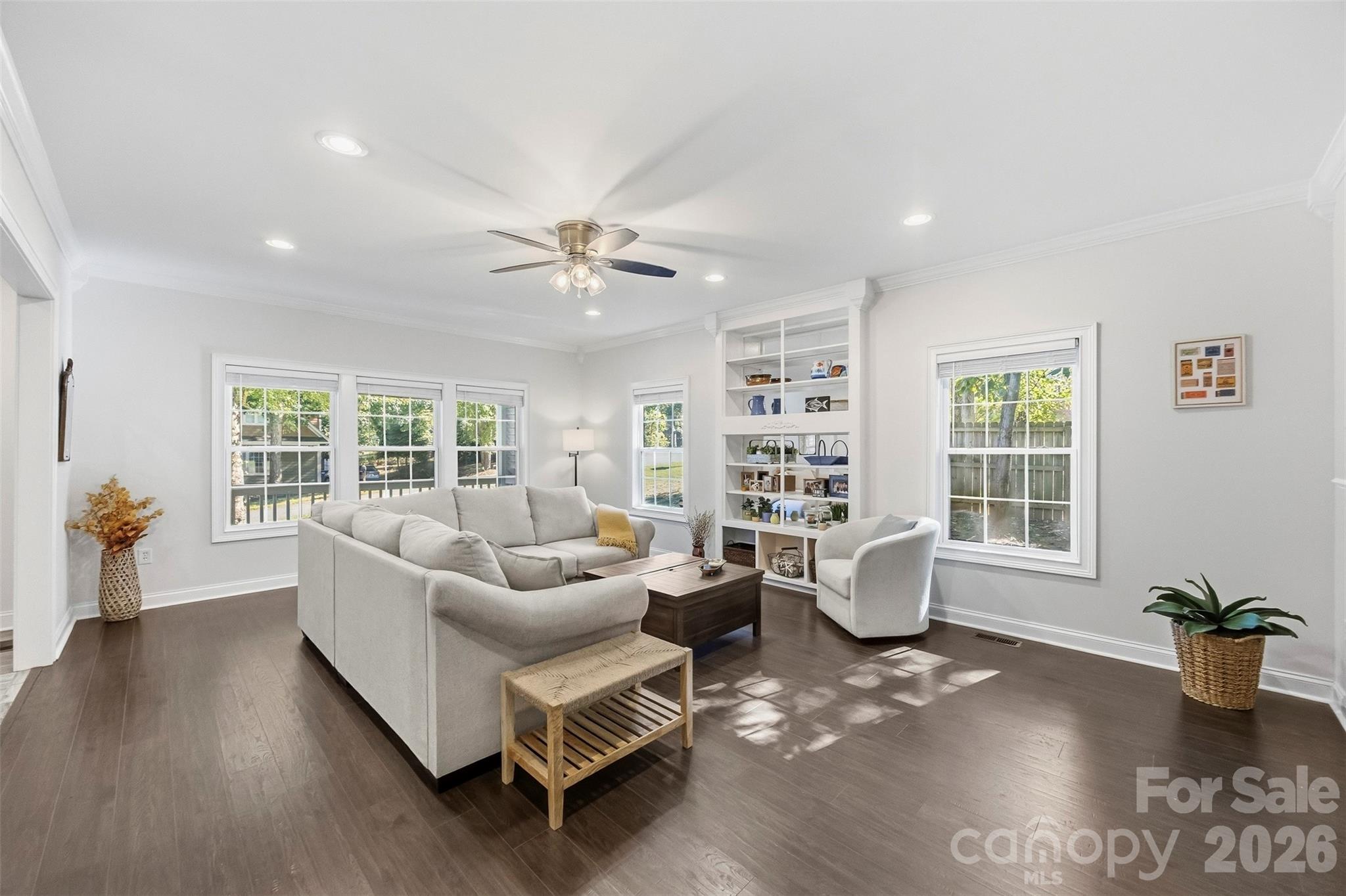 Living room with lots of windows for a bright and airy room - 109 Fulton Farms Lane, Mooresville