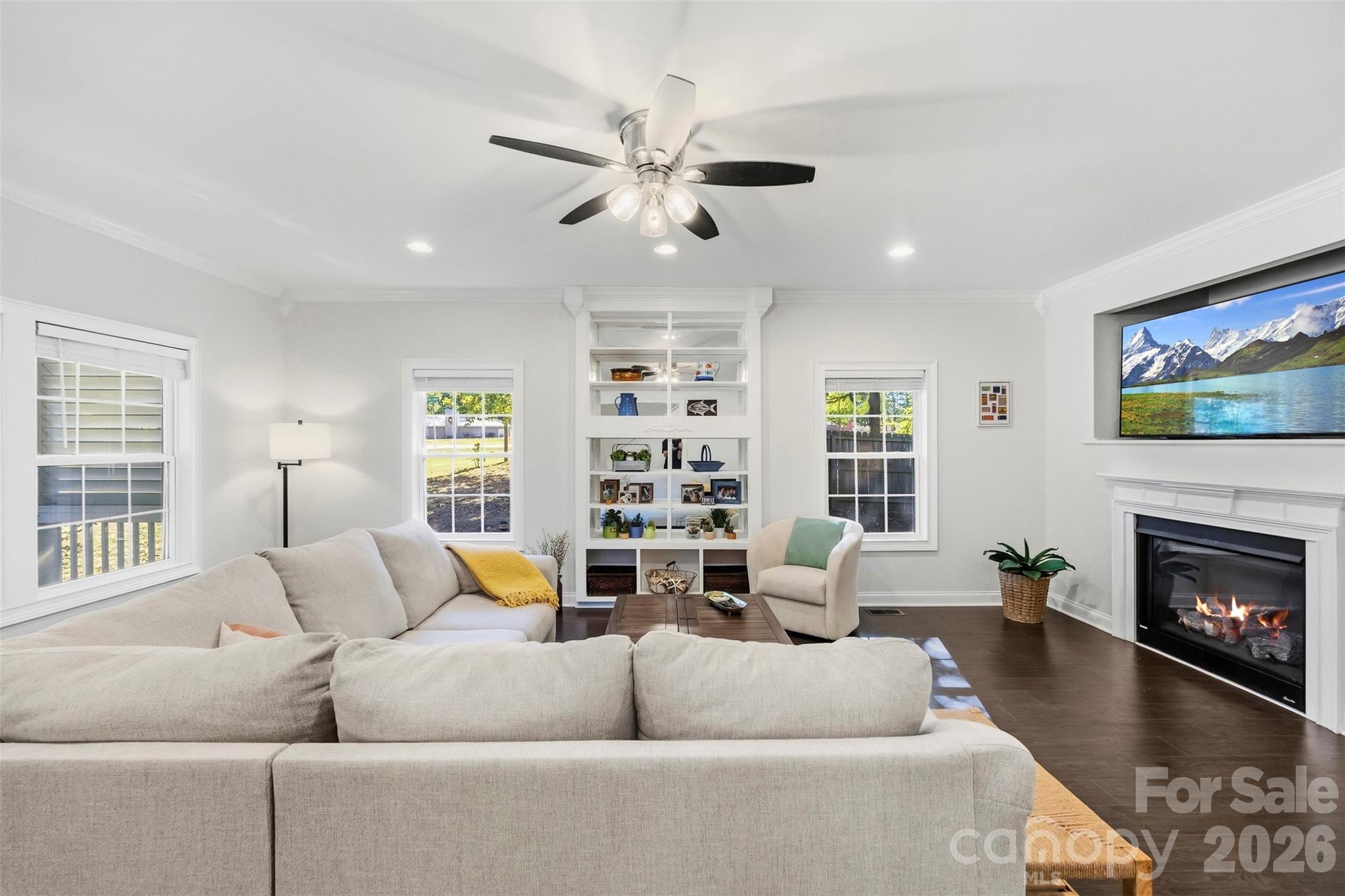 Living room with built-ins - 109 Fulton Farms Lane, Mooresville