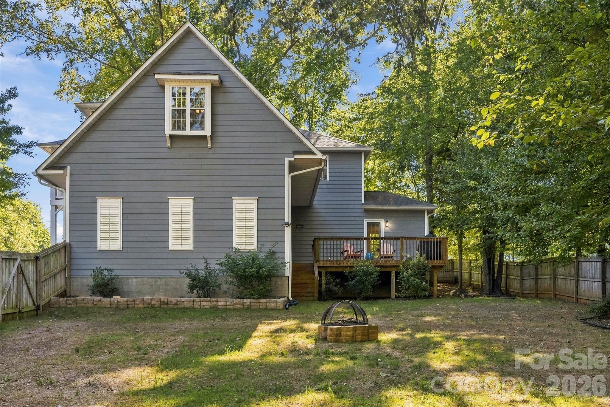 Back of home with deck - 109 Fulton Farms Lane, Mooresville