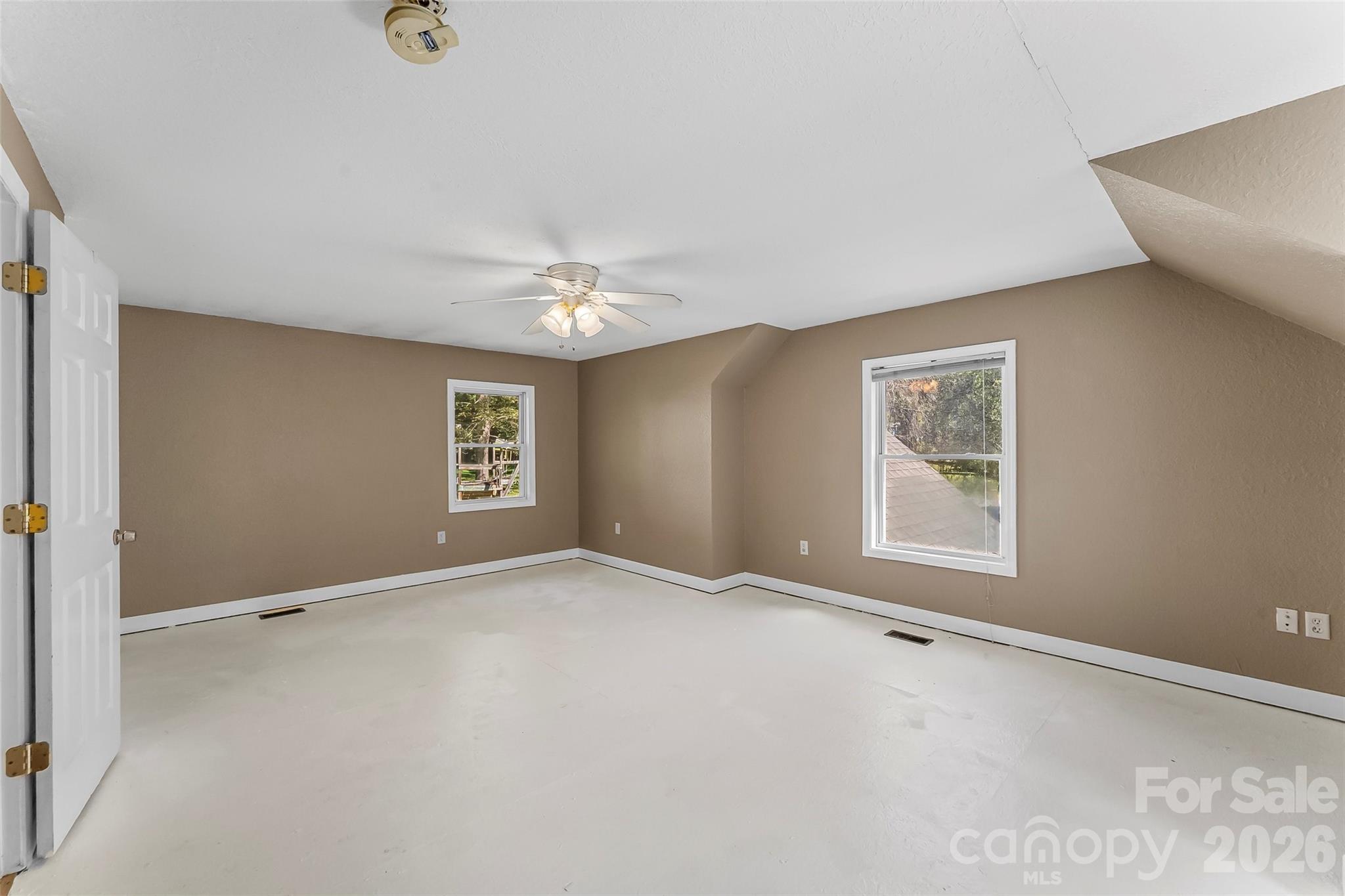 Upstairs primary bedroom (buyer to choose/install flooring) - 221 Old US 70 Highway E, Black Mountain