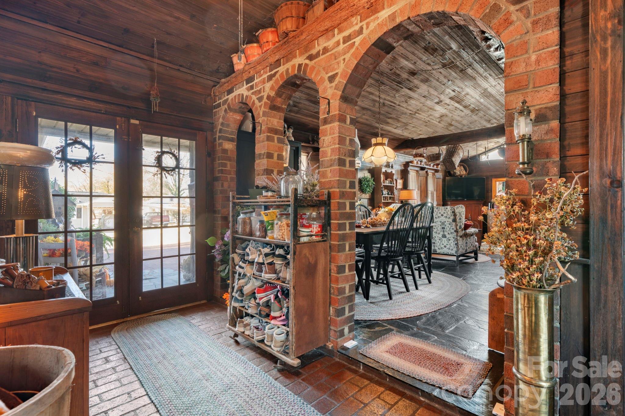 brick arches frame the entryway into the large flex space - 901 Union Street, Maiden